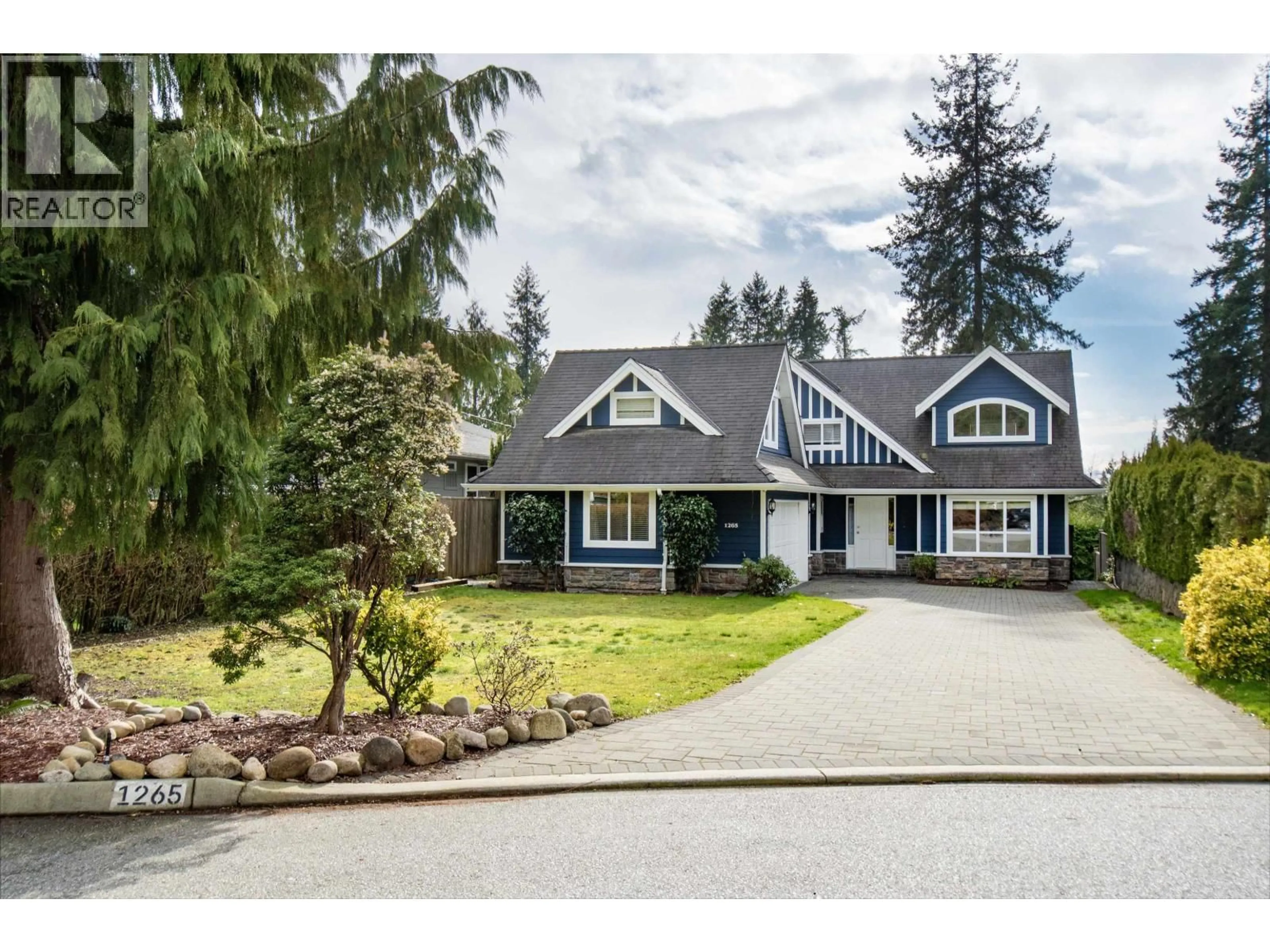 Home with vinyl exterior material, street for 1265 BRANTWOOD ROAD, North Vancouver British Columbia V7R1G6