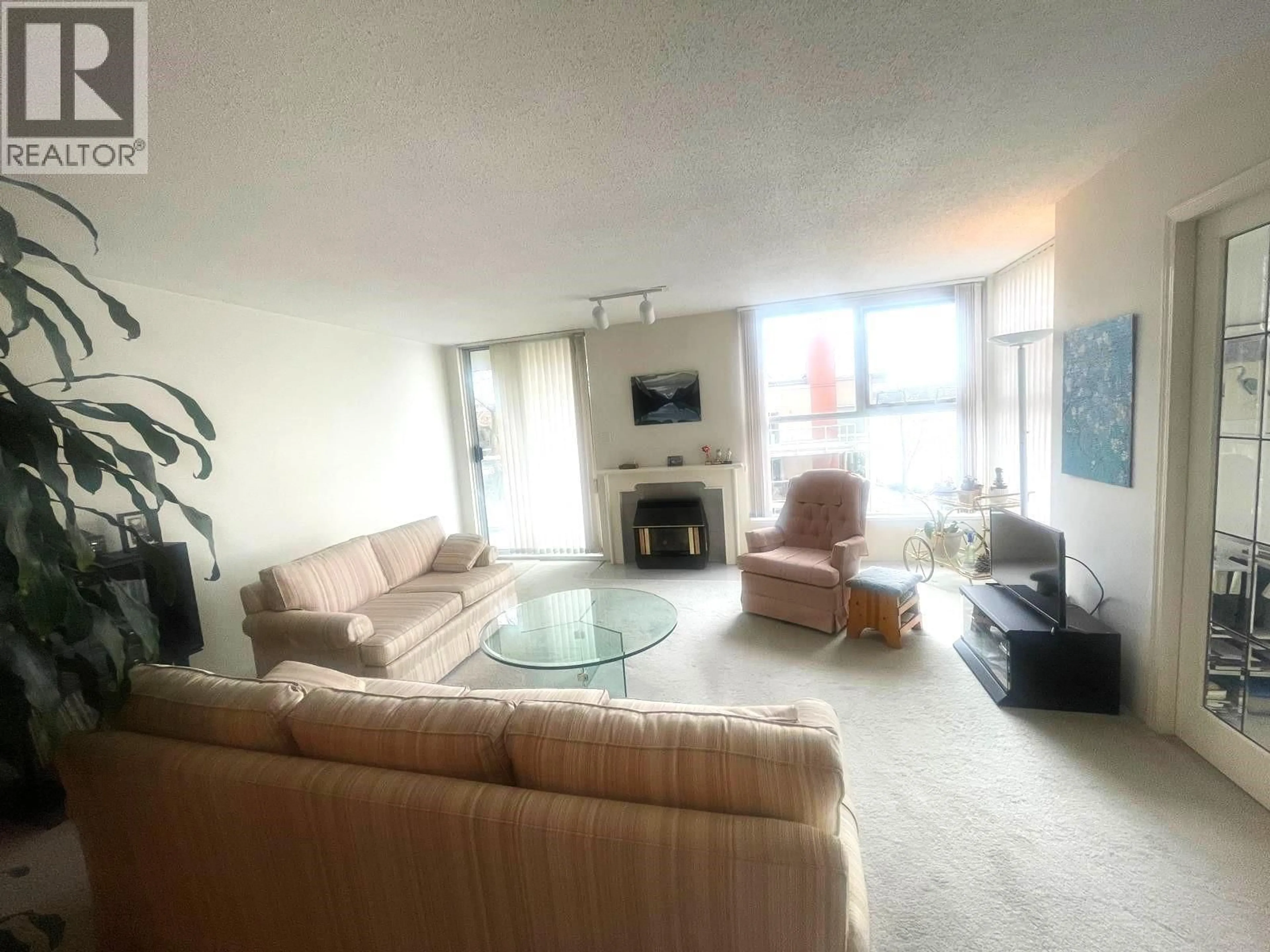 Living room with furniture, floor is not visible for 403 - 1250 QUAYSIDE DRIVE, New Westminster British Columbia V3M6E2