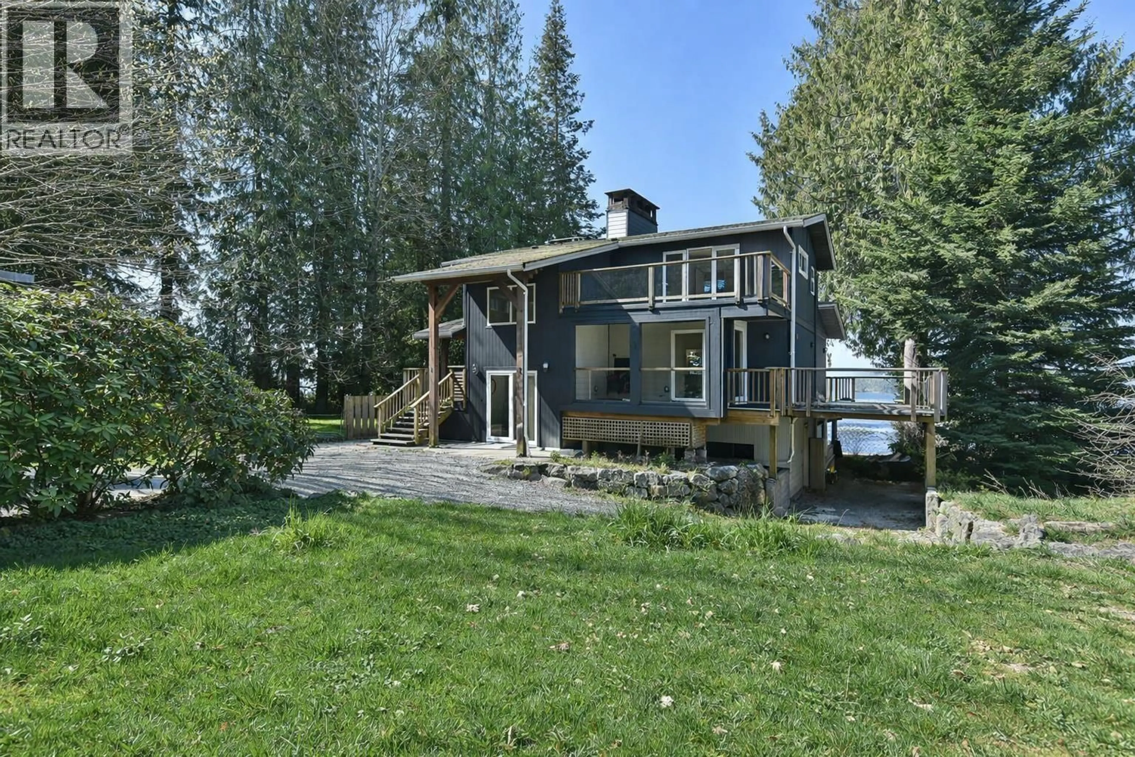 A pic from outside/outdoor area/front of a property/back of a property/a pic from drone, unknown for 8429 REDROOFFS ROAD, Halfmoon Bay British Columbia V7Z1E6
