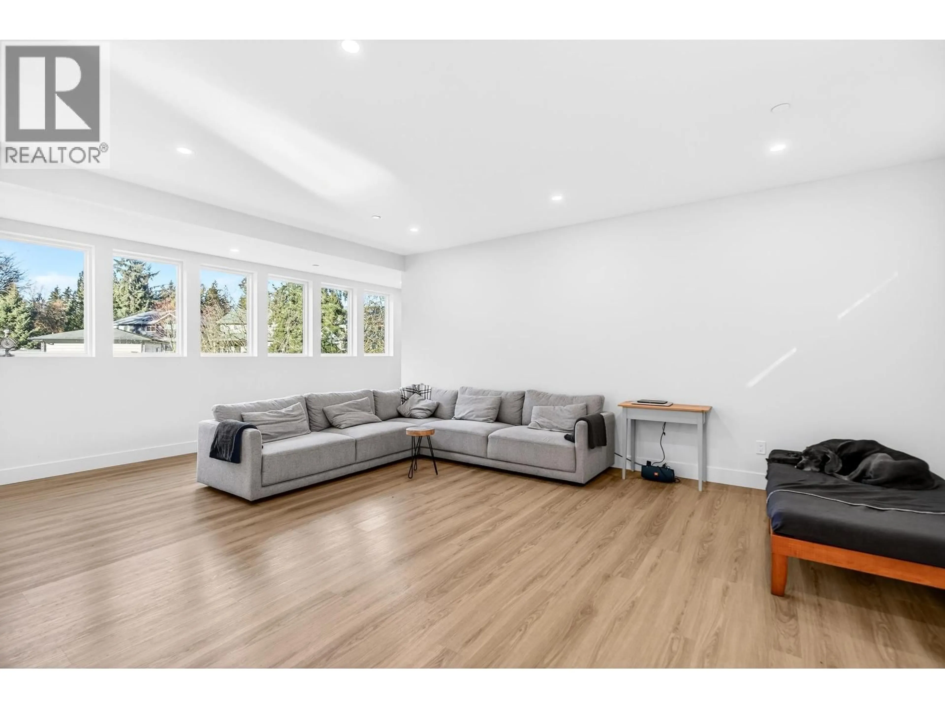 Living room with furniture, wood/laminate floor for 24025 FERN CRESCENT, Maple Ridge British Columbia V4R2S1