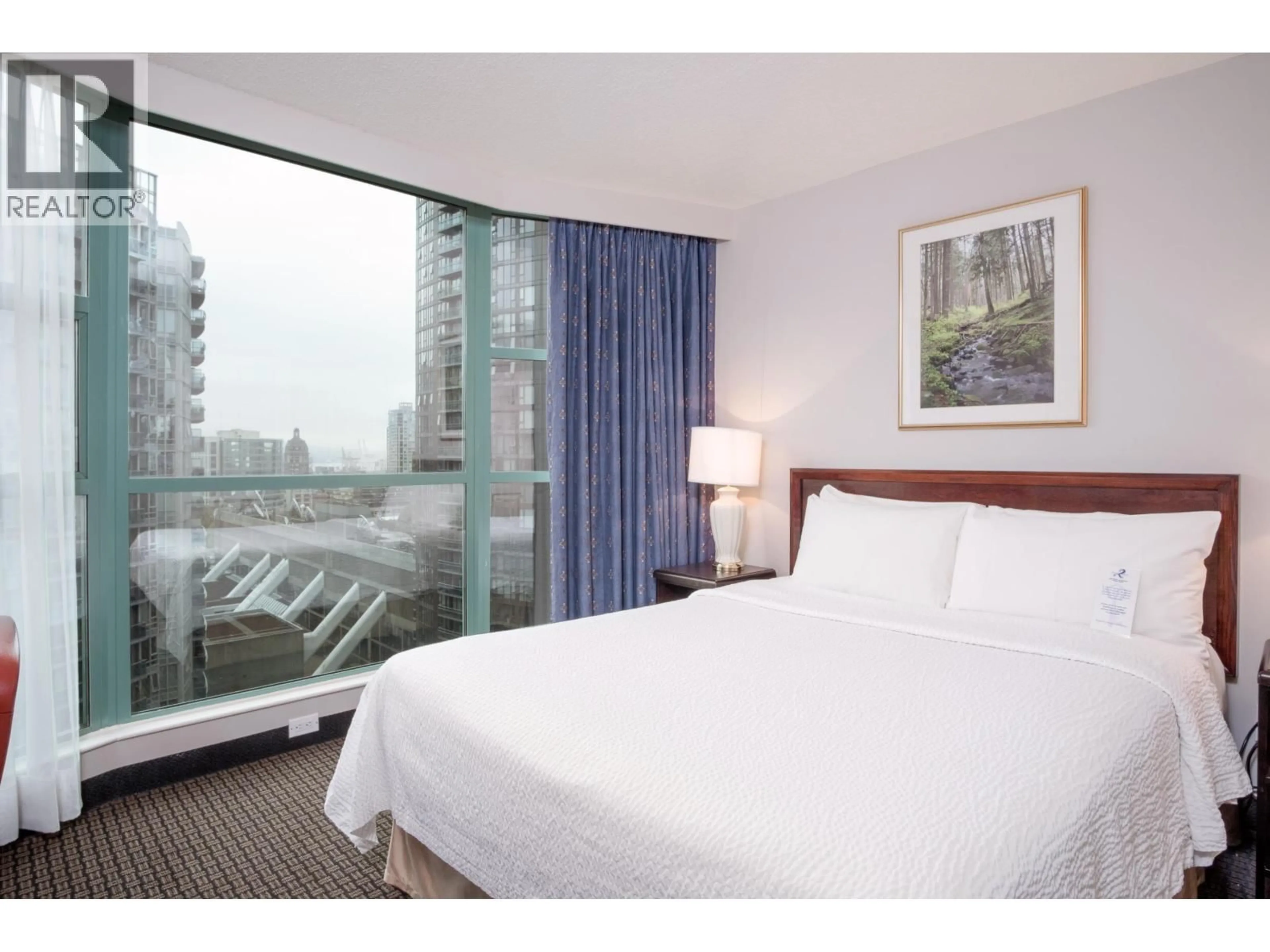 Bedroom with bed, wood/laminate floor for 1609 - 838 HAMILTON STREET, Vancouver British Columbia V6B6A2