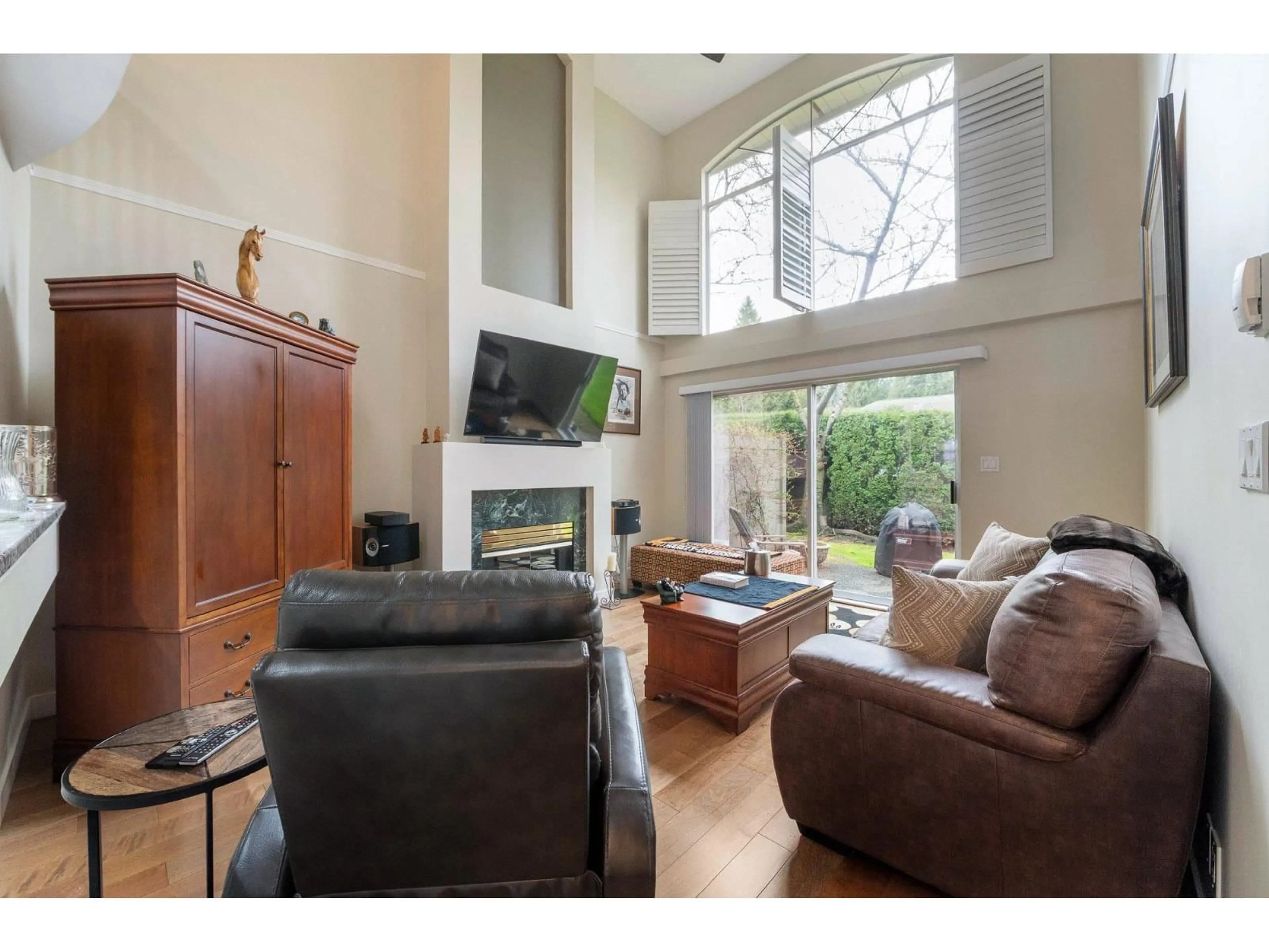 Living room with furniture, wood/laminate floor for 67 - 2500 152 STREET, Surrey British Columbia V4P1M8