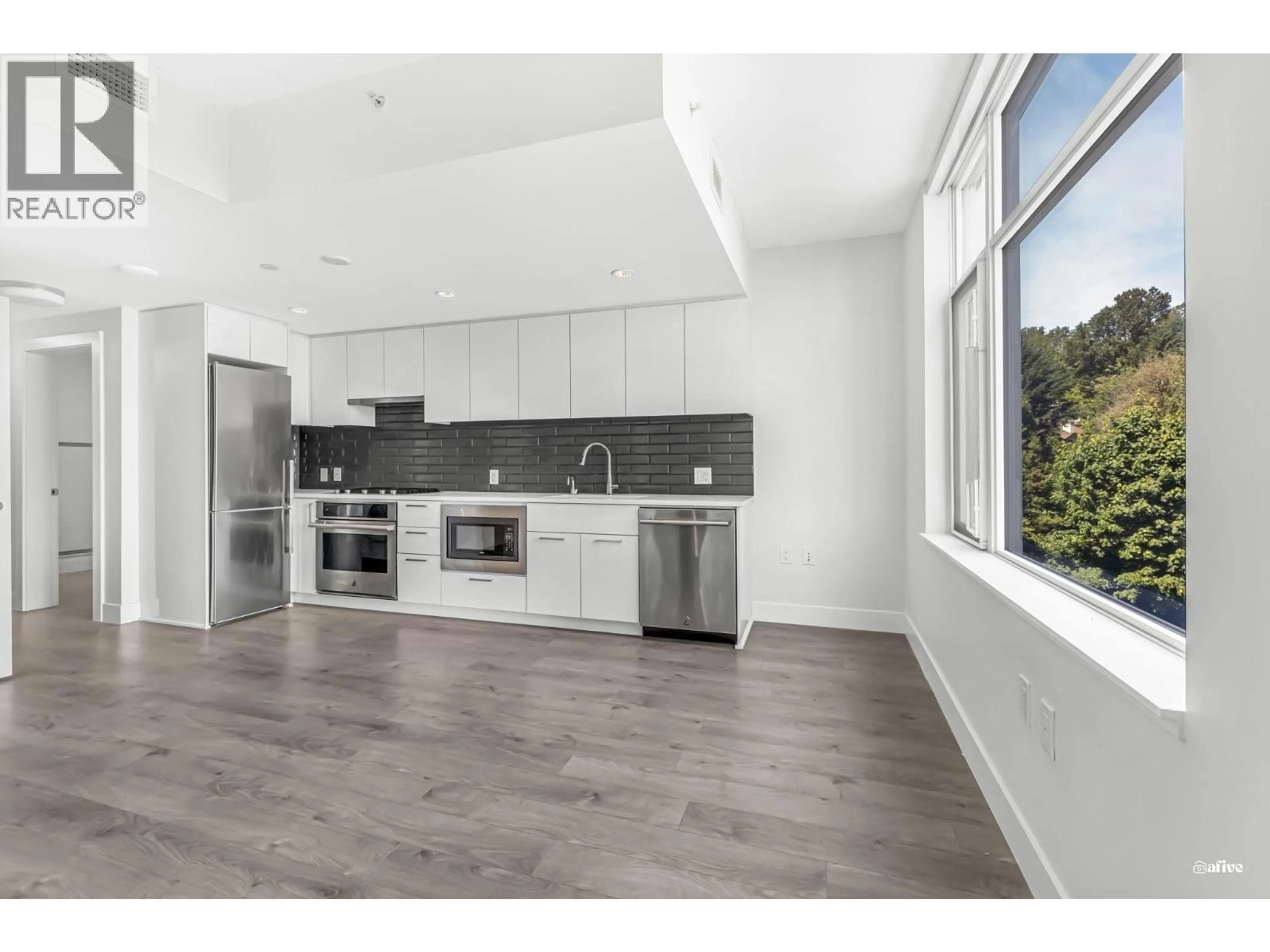 Open concept kitchen, unknown for 614 - 3451 SAWMILL CRESCENT, Vancouver British Columbia V5S0H1