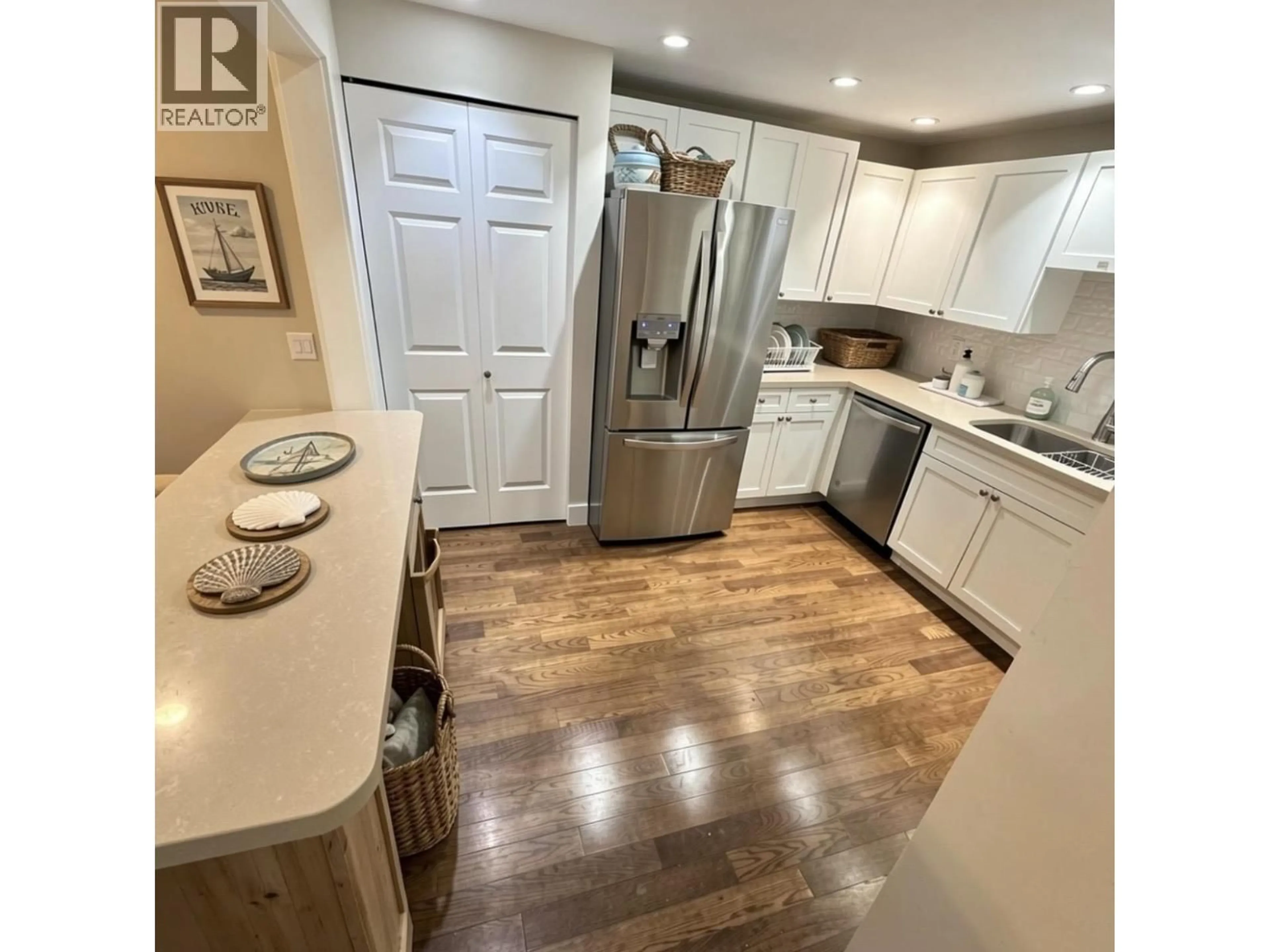 Open concept kitchen, wood/laminate floor for 110 - 1150 54A STREET, Delta British Columbia V4M4B5