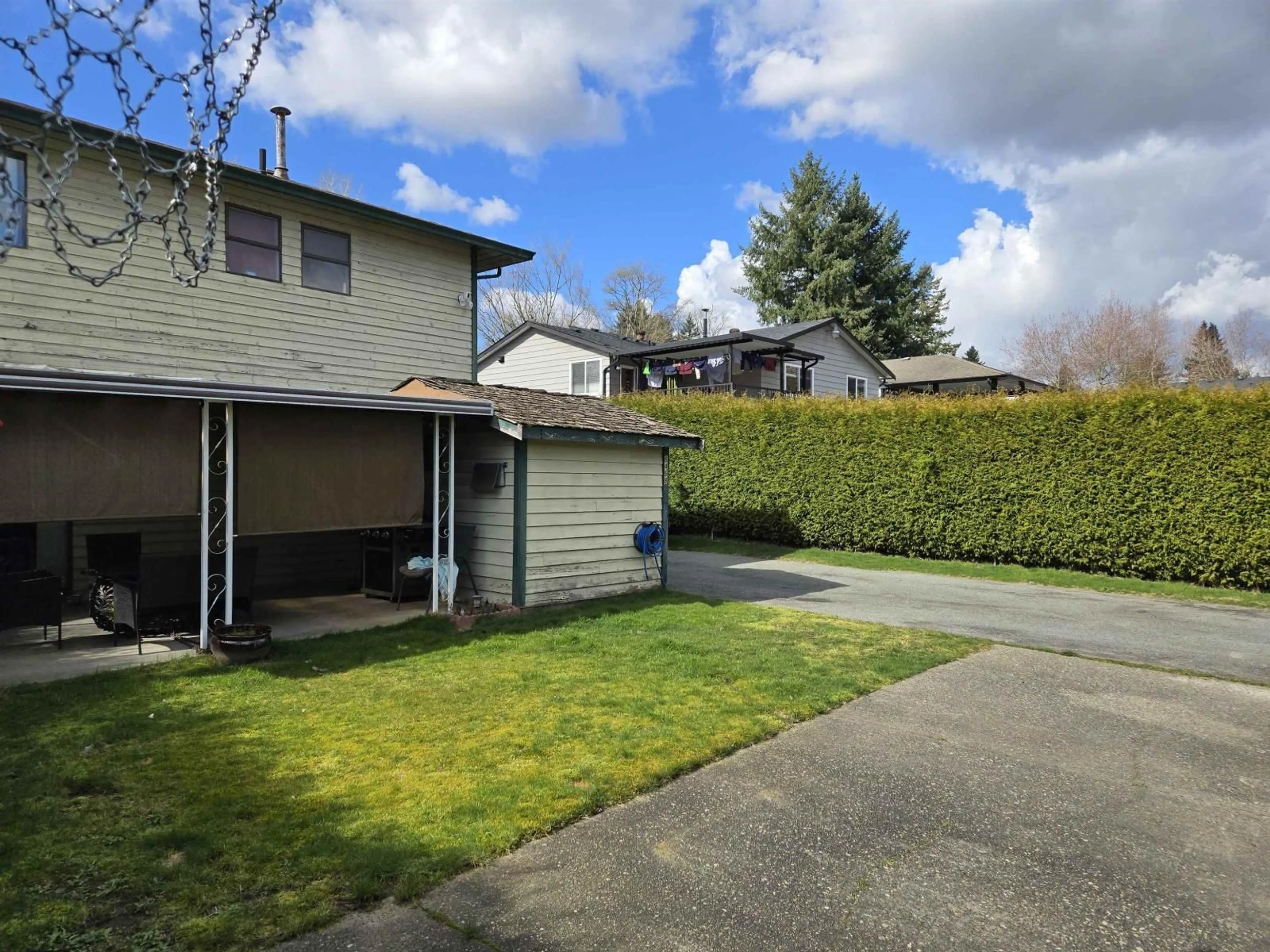 A pic from outside/outdoor area/front of a property/back of a property/a pic from drone, street for 8468 144TH STREET, Surrey British Columbia V3W5T7