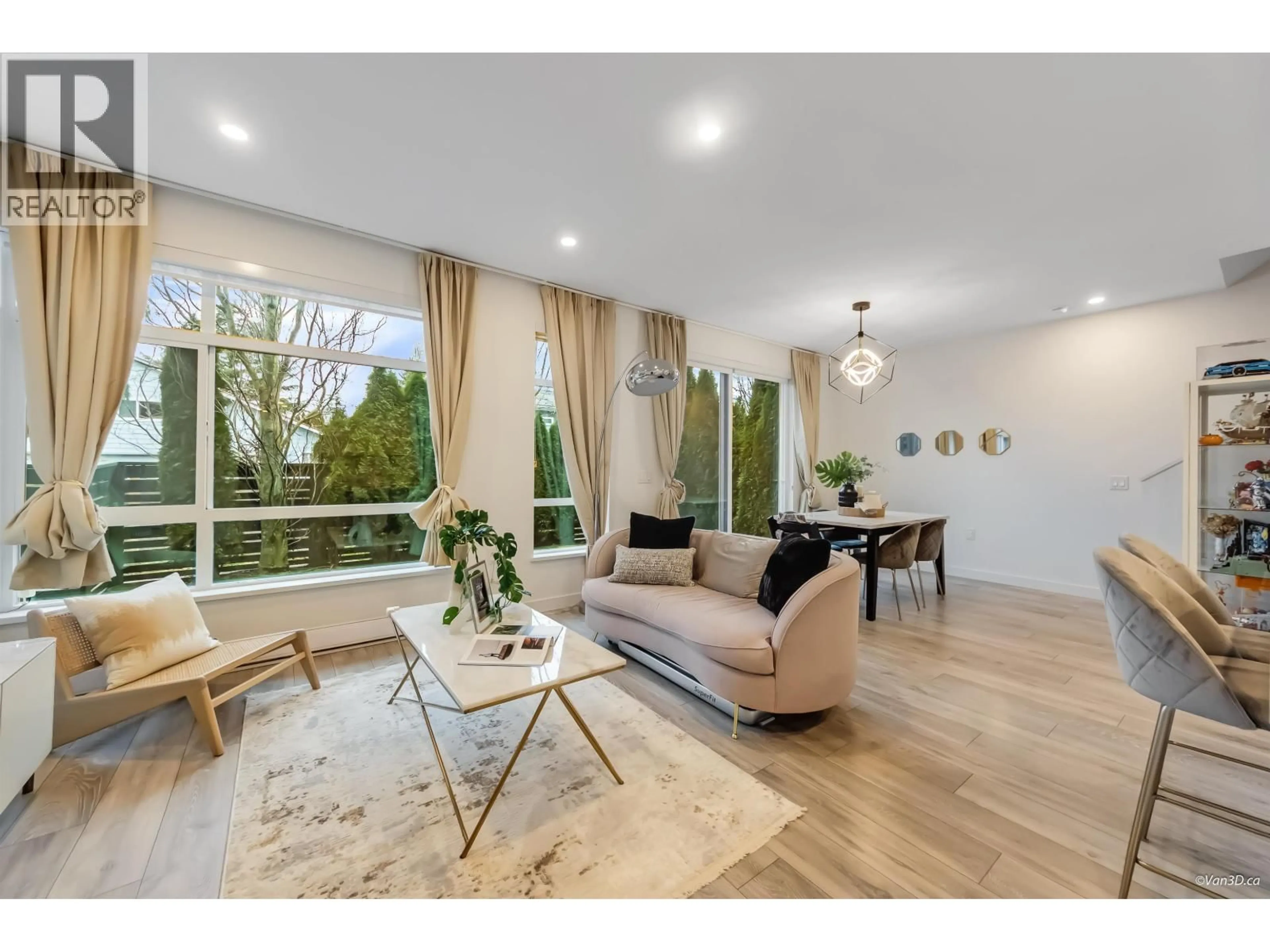 Living room with furniture, wood/laminate floor for 25 - 10511 NO. 5 ROAD, Richmond British Columbia V7Z0B2