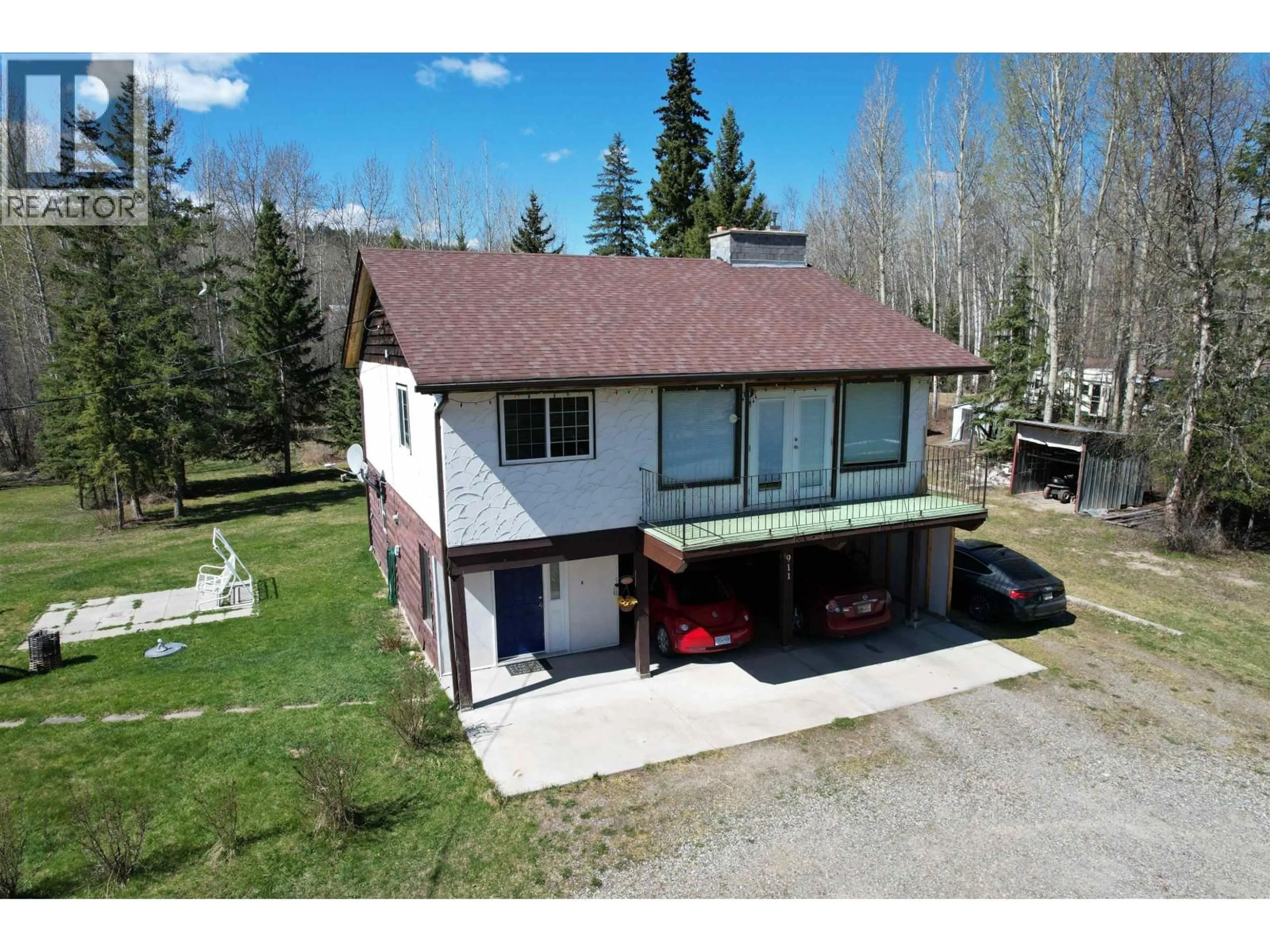 A pic from outside/outdoor area/front of a property/back of a property/a pic from drone, unknown for 911 HESKETH ROAD, Bouchie Lake British Columbia V2J7H6