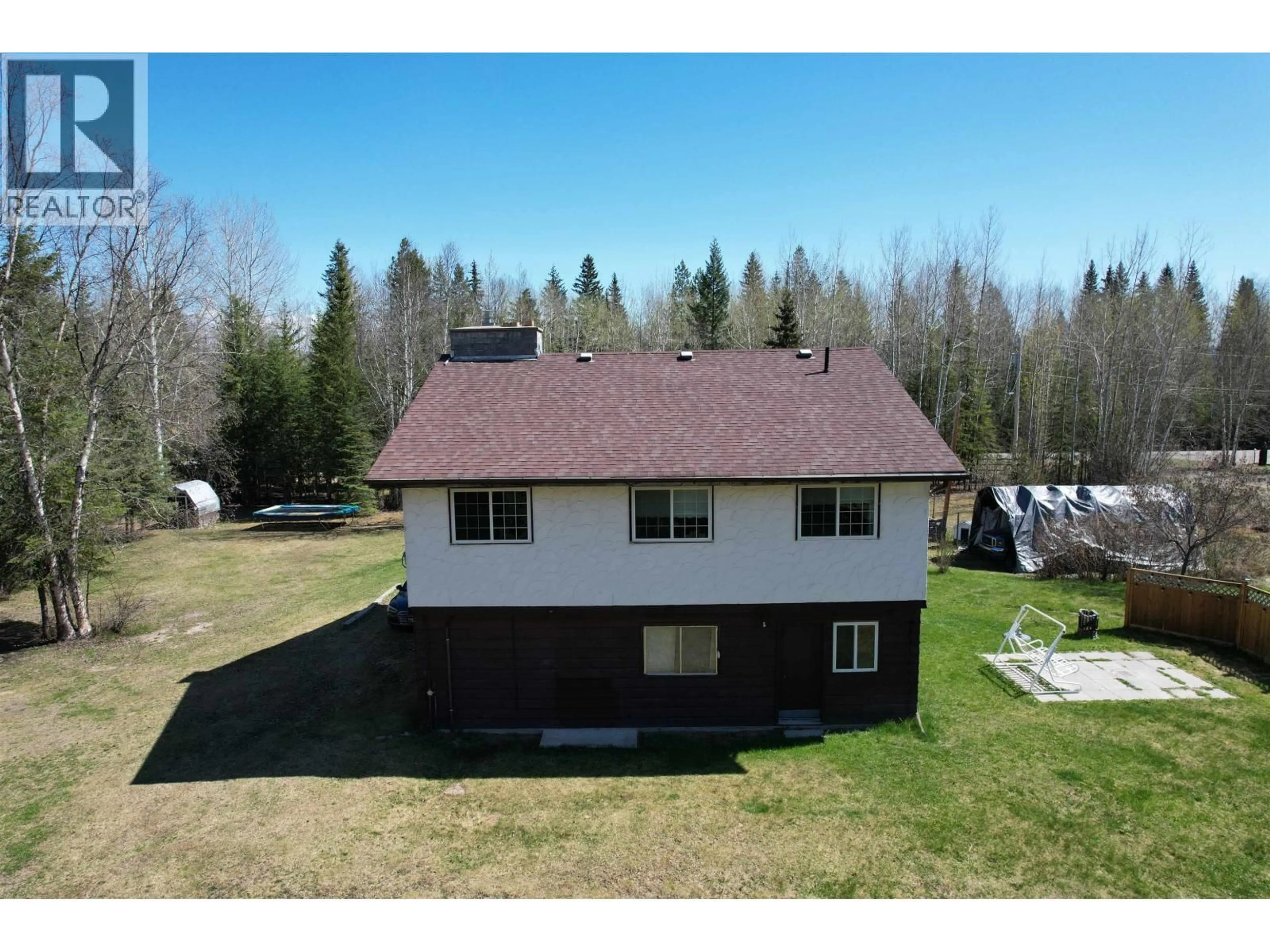 A pic from outside/outdoor area/front of a property/back of a property/a pic from drone, unknown for 911 HESKETH ROAD, Bouchie Lake British Columbia V2J7H6