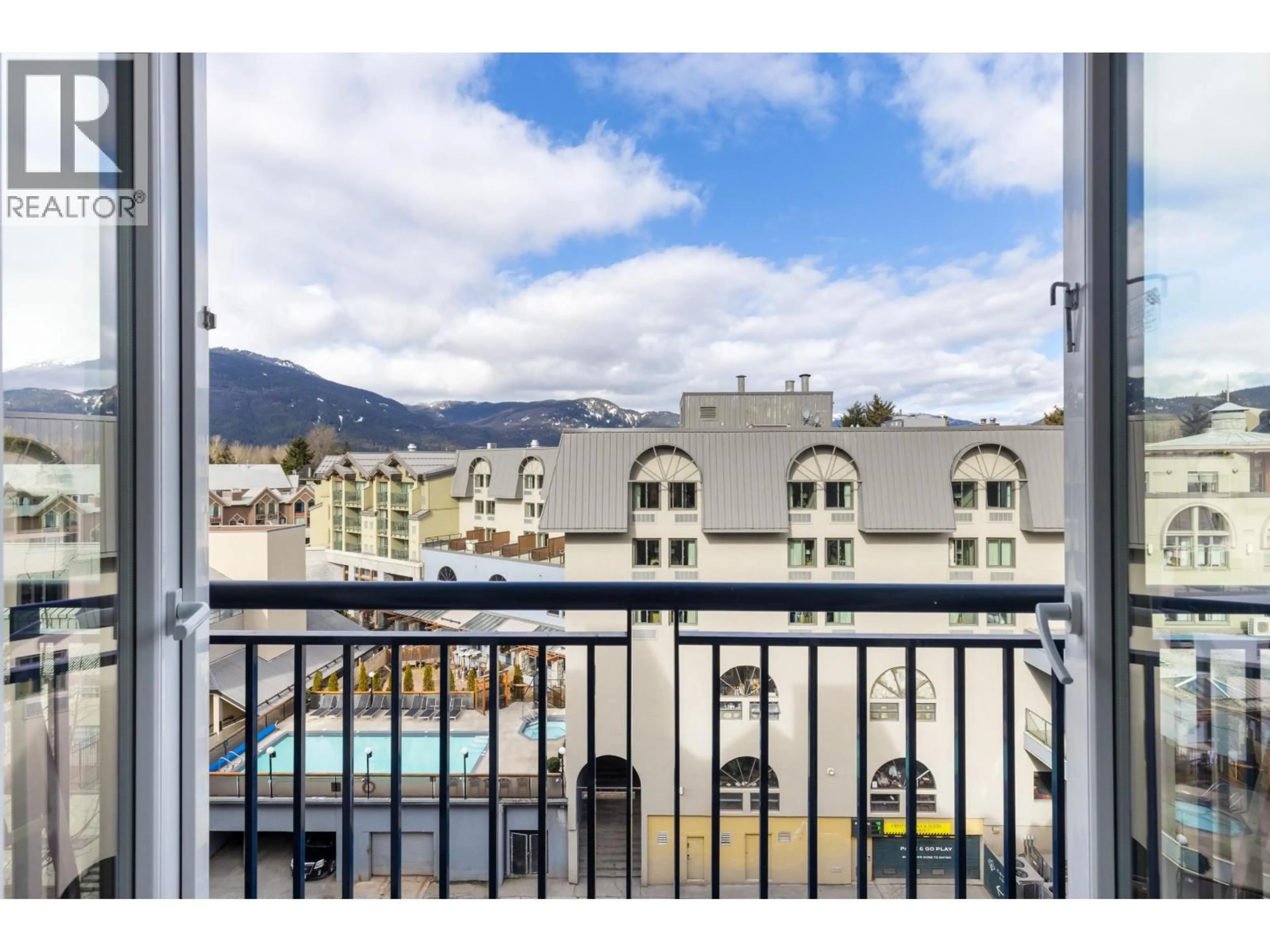 Balcony in the apartment, city buildings view from balcony for 613 - 4050 WHISTLER WAY, Whistler British Columbia V8E1H9