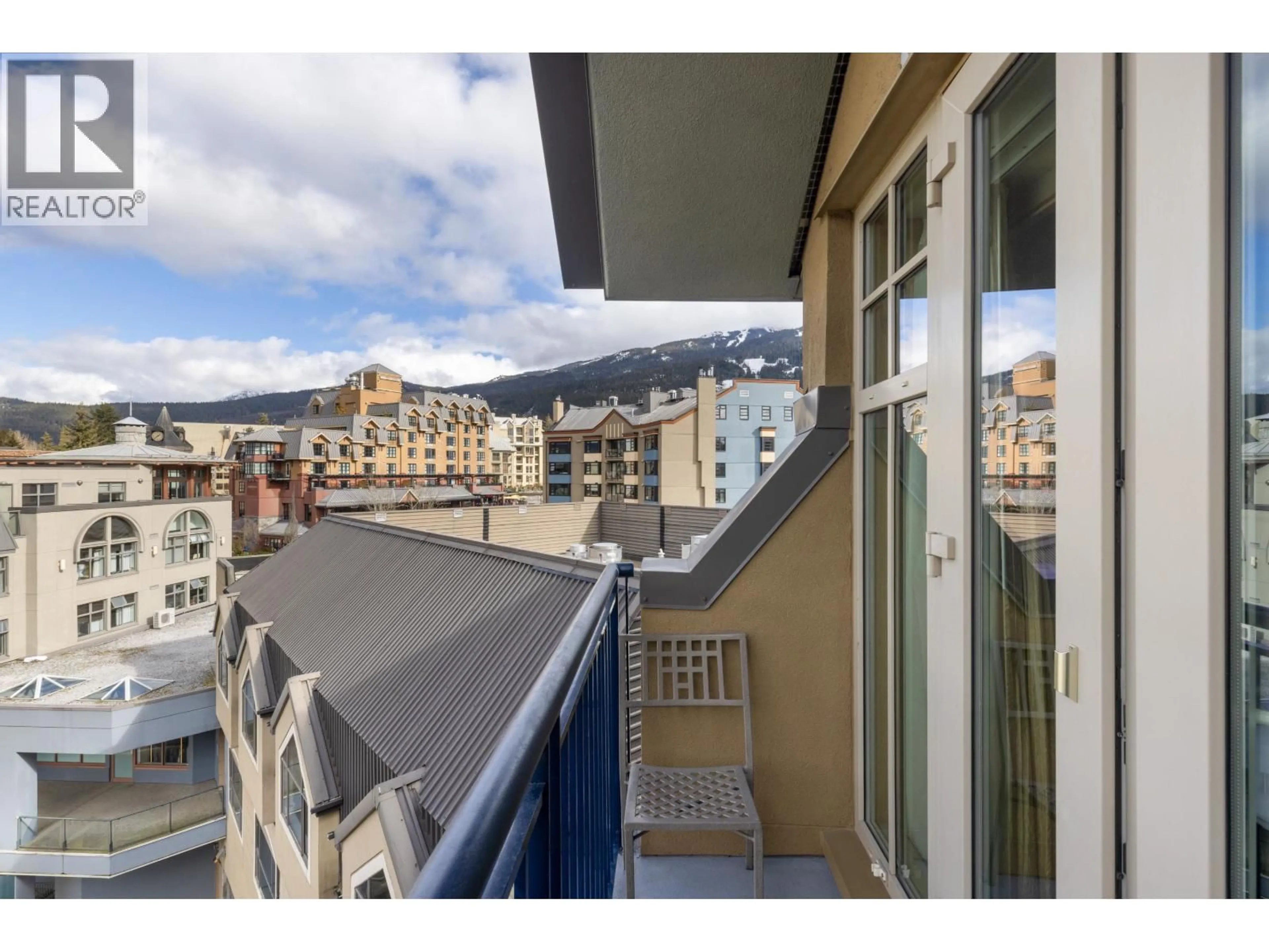 Balcony in the apartment, city buildings view from balcony for 613 - 4050 WHISTLER WAY, Whistler British Columbia V8E1H9