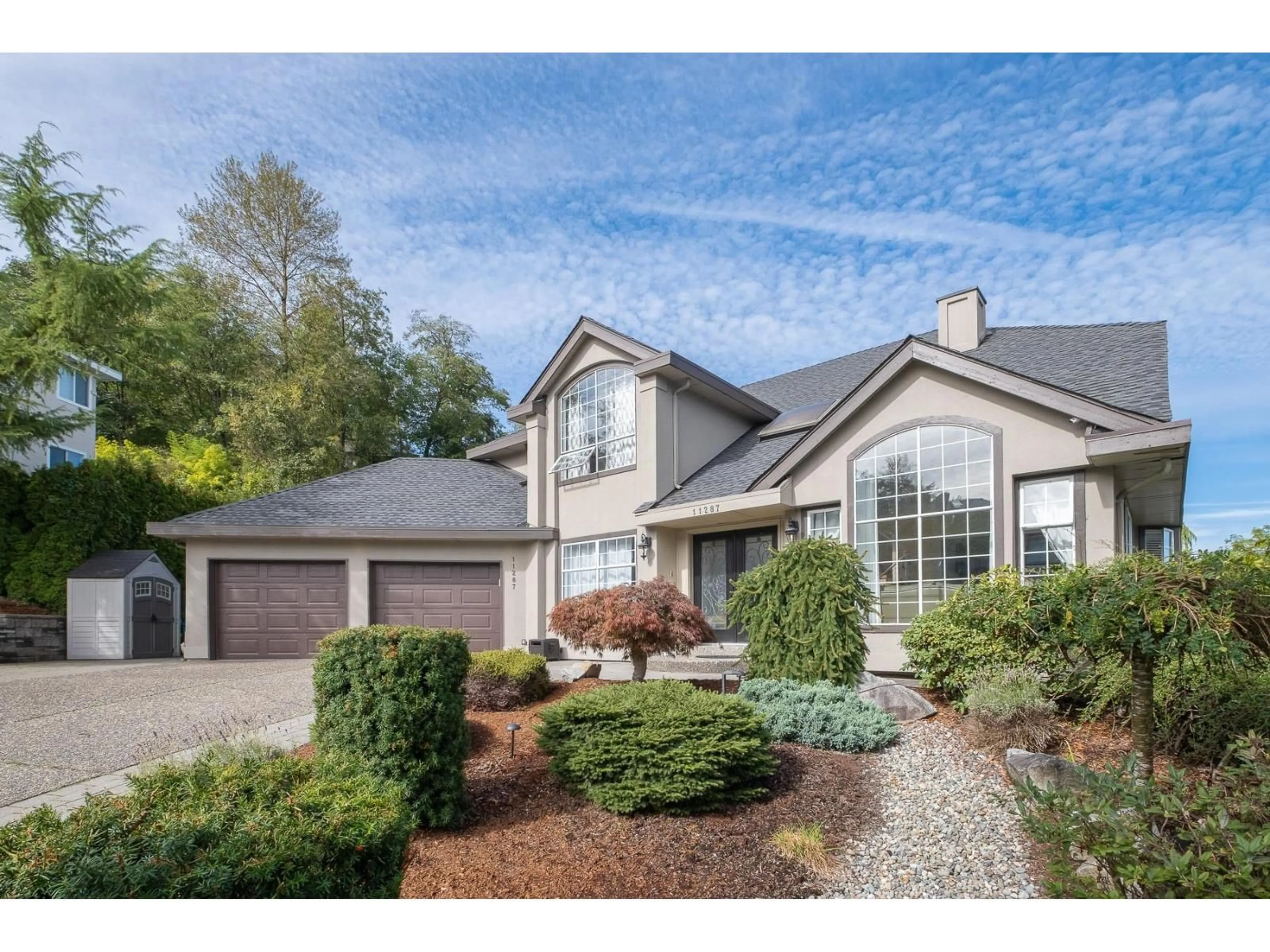 Home with vinyl exterior material, street for 11287 159A STREET, Surrey British Columbia V4N1R5