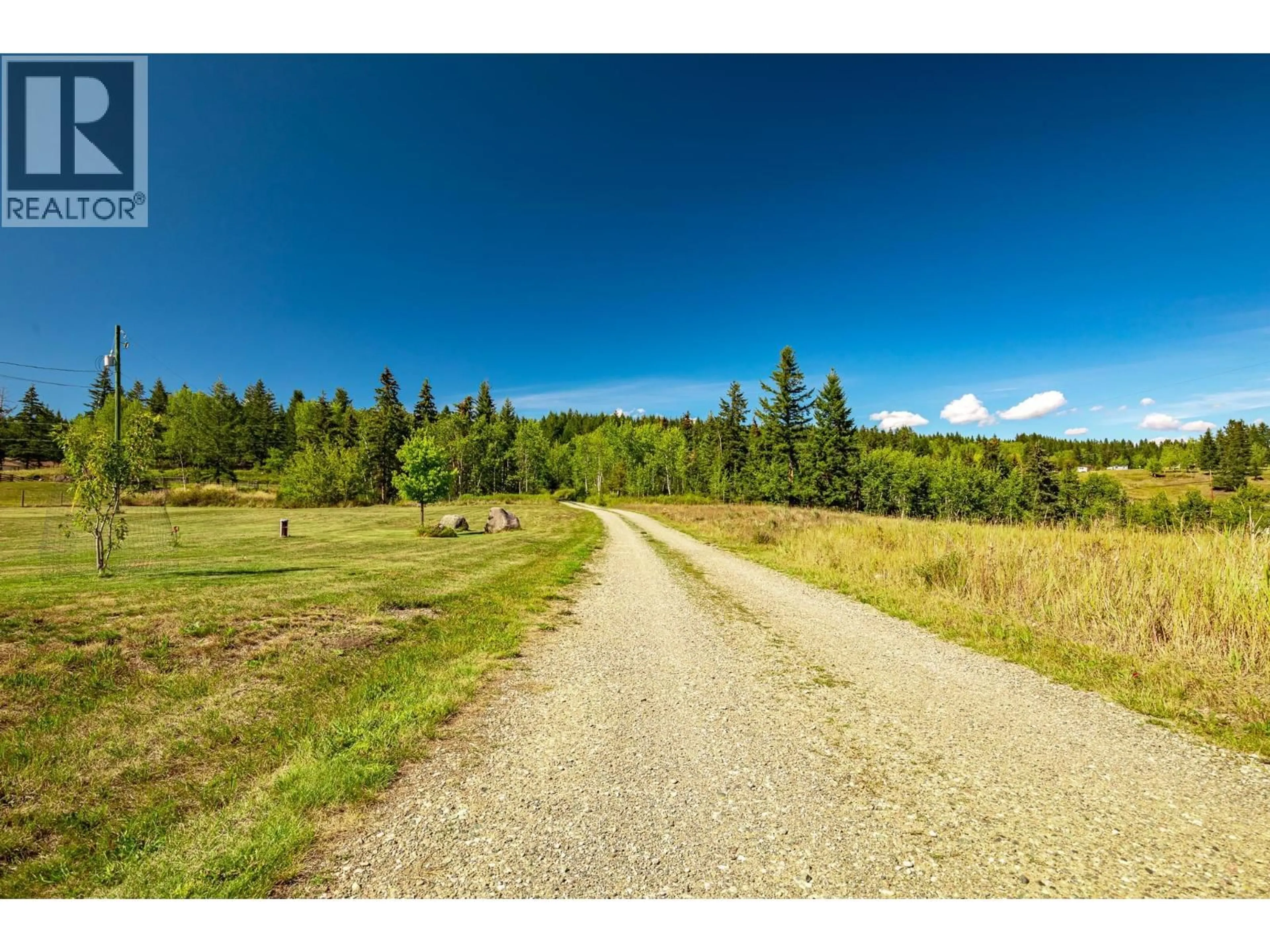 A pic from outside/outdoor area/front of a property/back of a property/a pic from drone, forest/trees view for 120 VALLEY ROAD, Williams Lake British Columbia V0K2G0