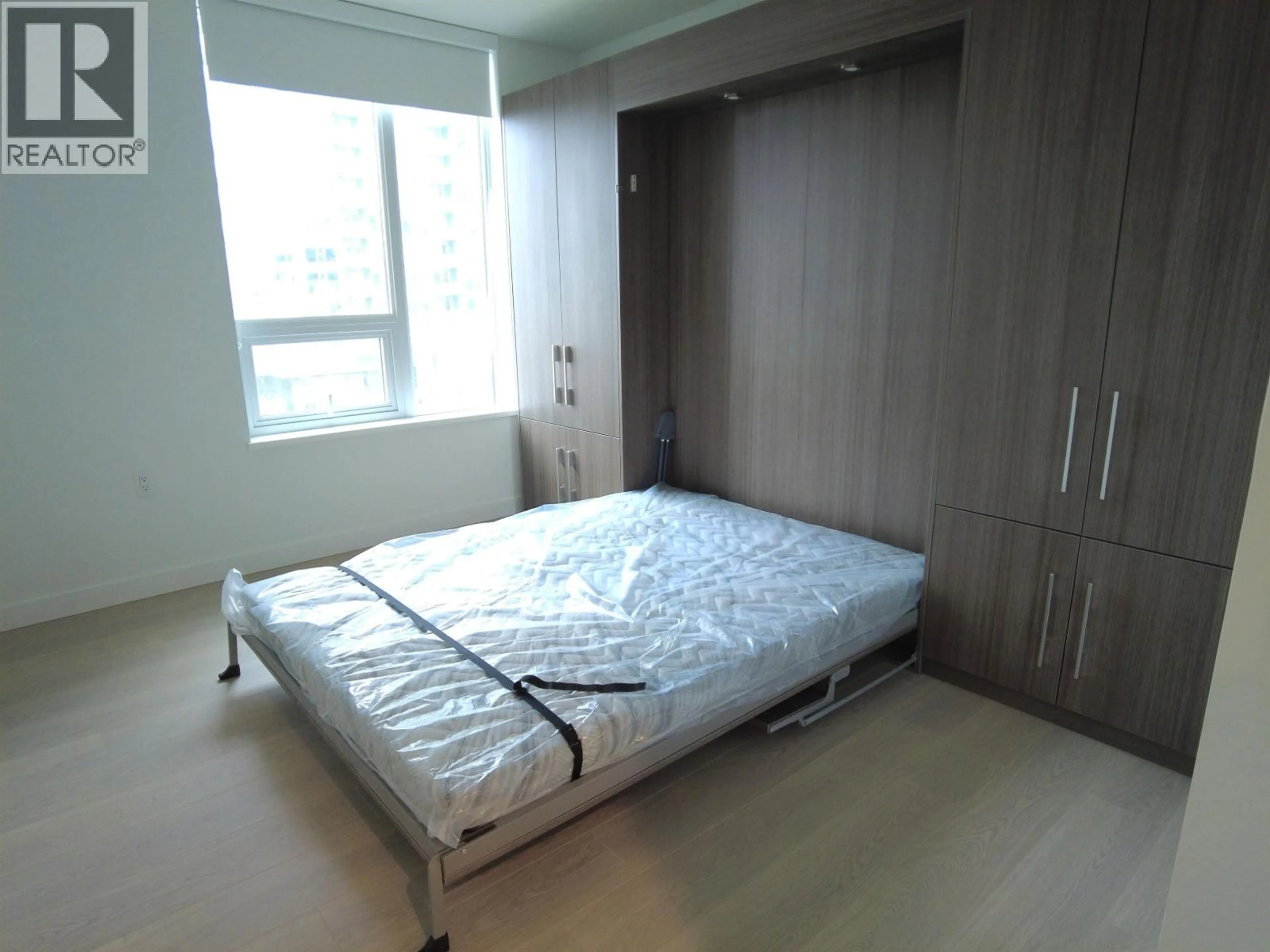 Bedroom with bed, floor is not visible for 307 - 6537 TELFORD AVENUE, Burnaby British Columbia V5H0K9