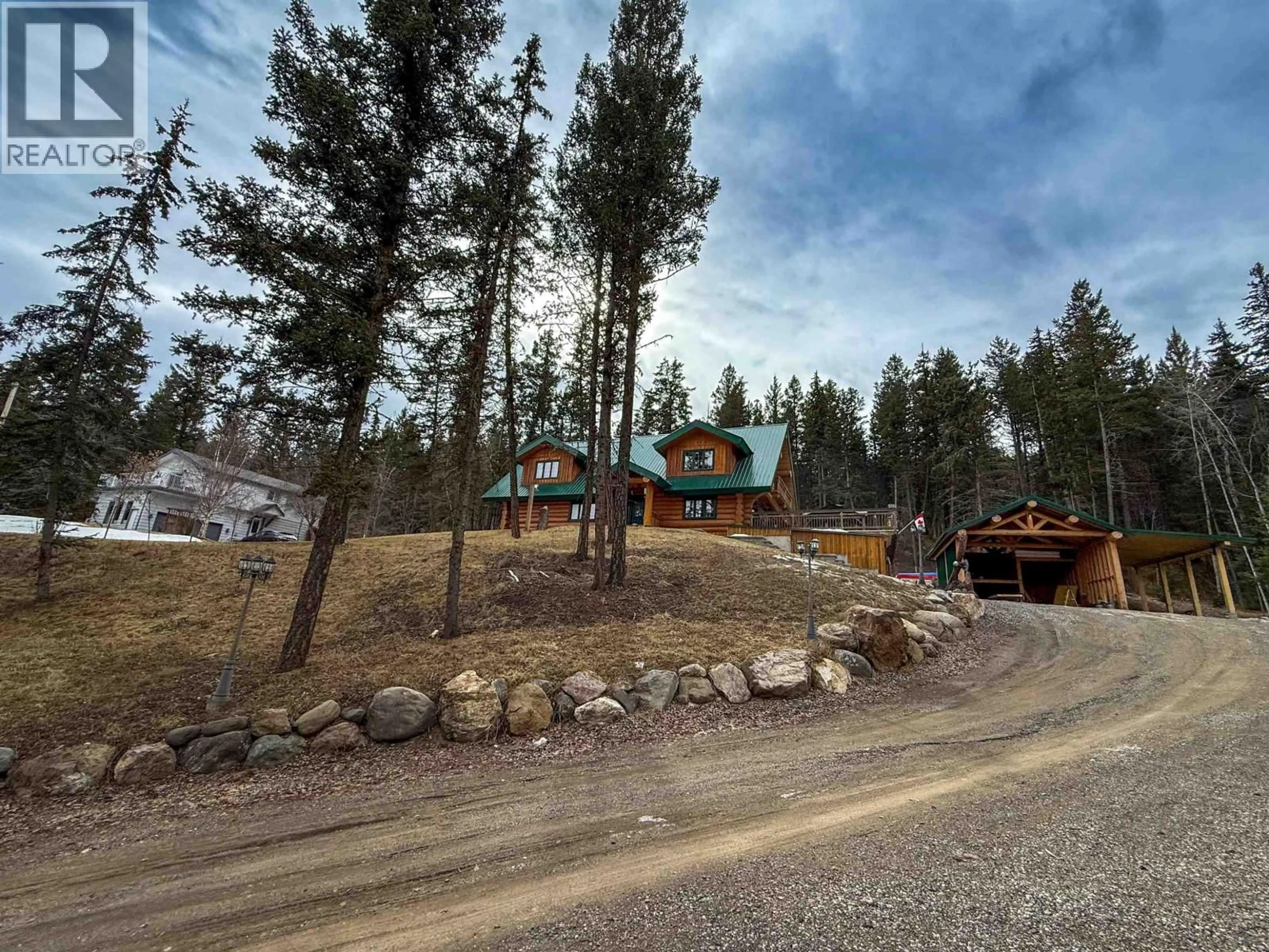 A pic from outside/outdoor area/front of a property/back of a property/a pic from drone, unknown for 5360 KALLUM DRIVE, 108 Mile Ranch British Columbia V0K2Z0