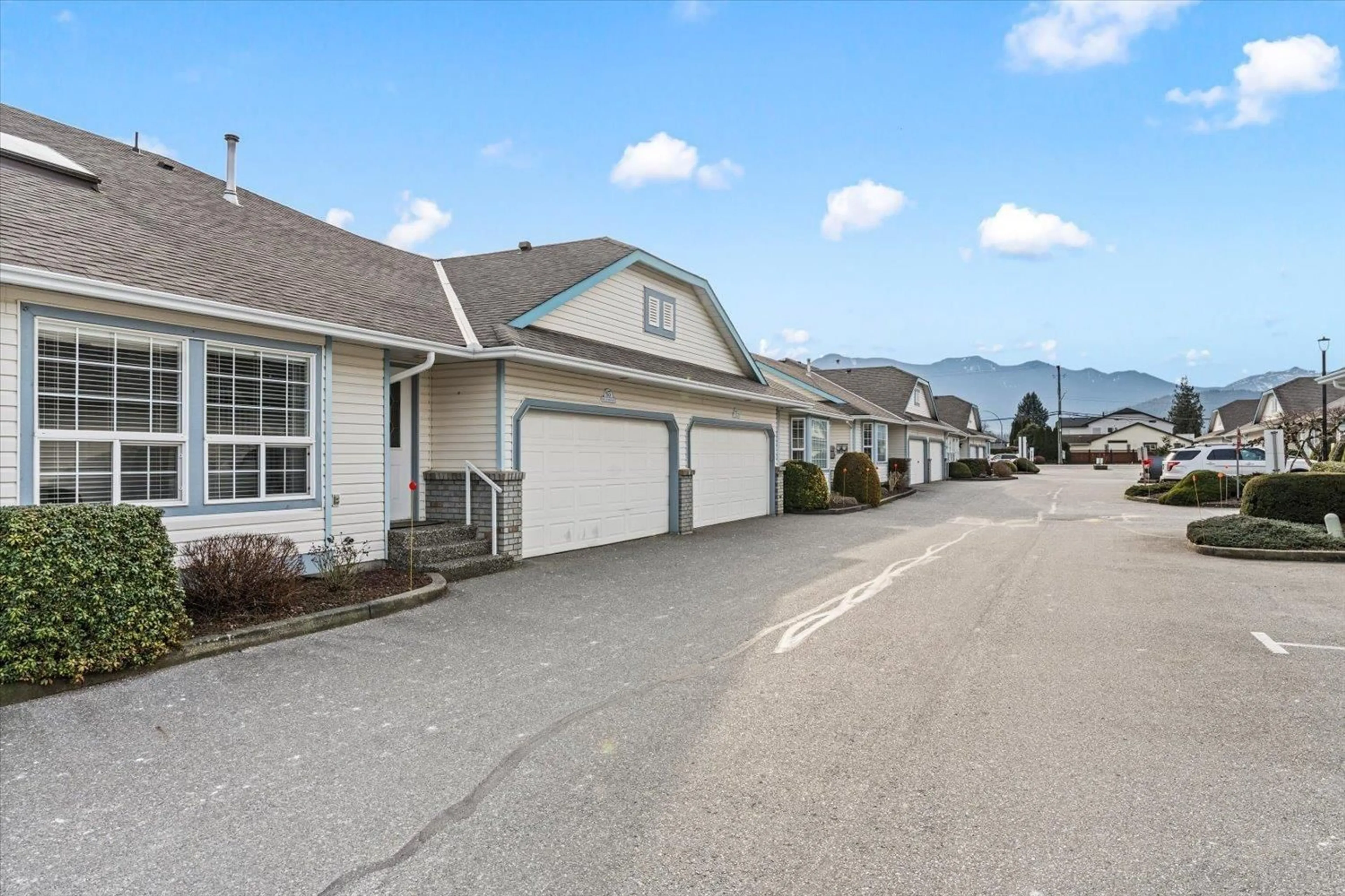 A pic from outside/outdoor area/front of a property/back of a property/a pic from drone, mountain view for 63 - 45175 WELLS ROAD, Chilliwack British Columbia V2R3K7