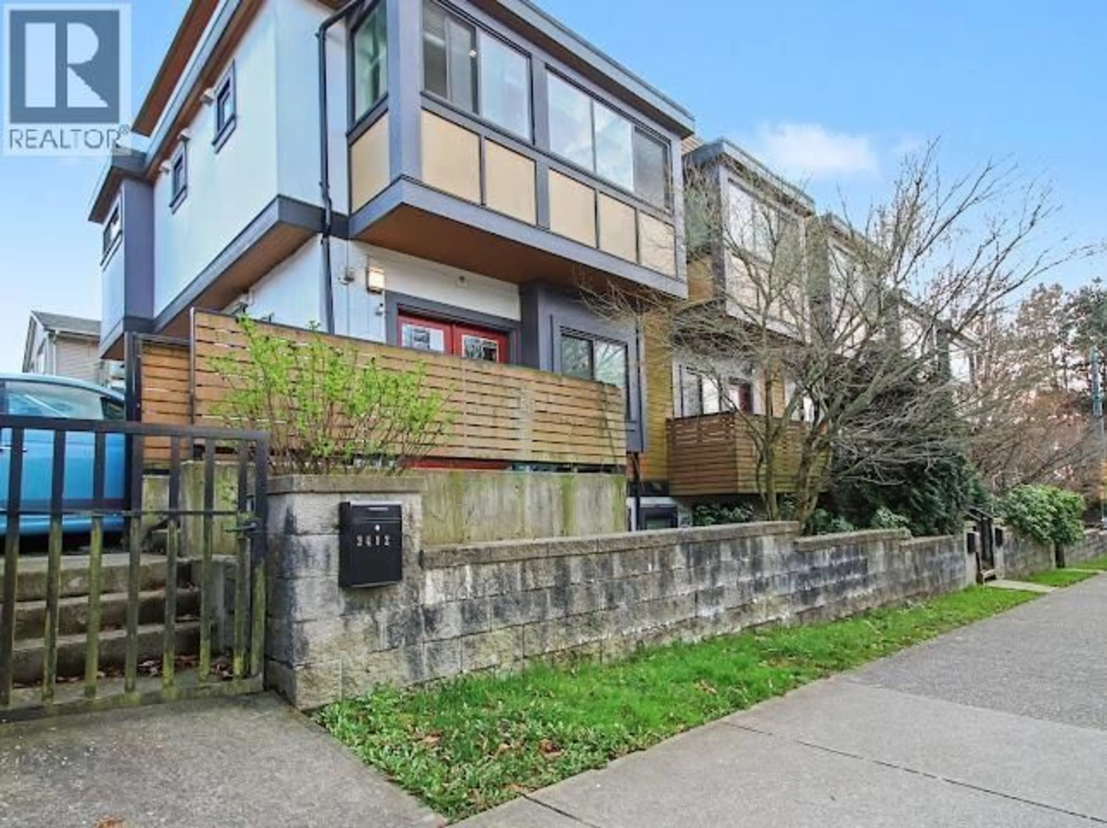 Home with brick exterior material, street for 2412 DUNDAS STREET, Vancouver British Columbia V5K1P6