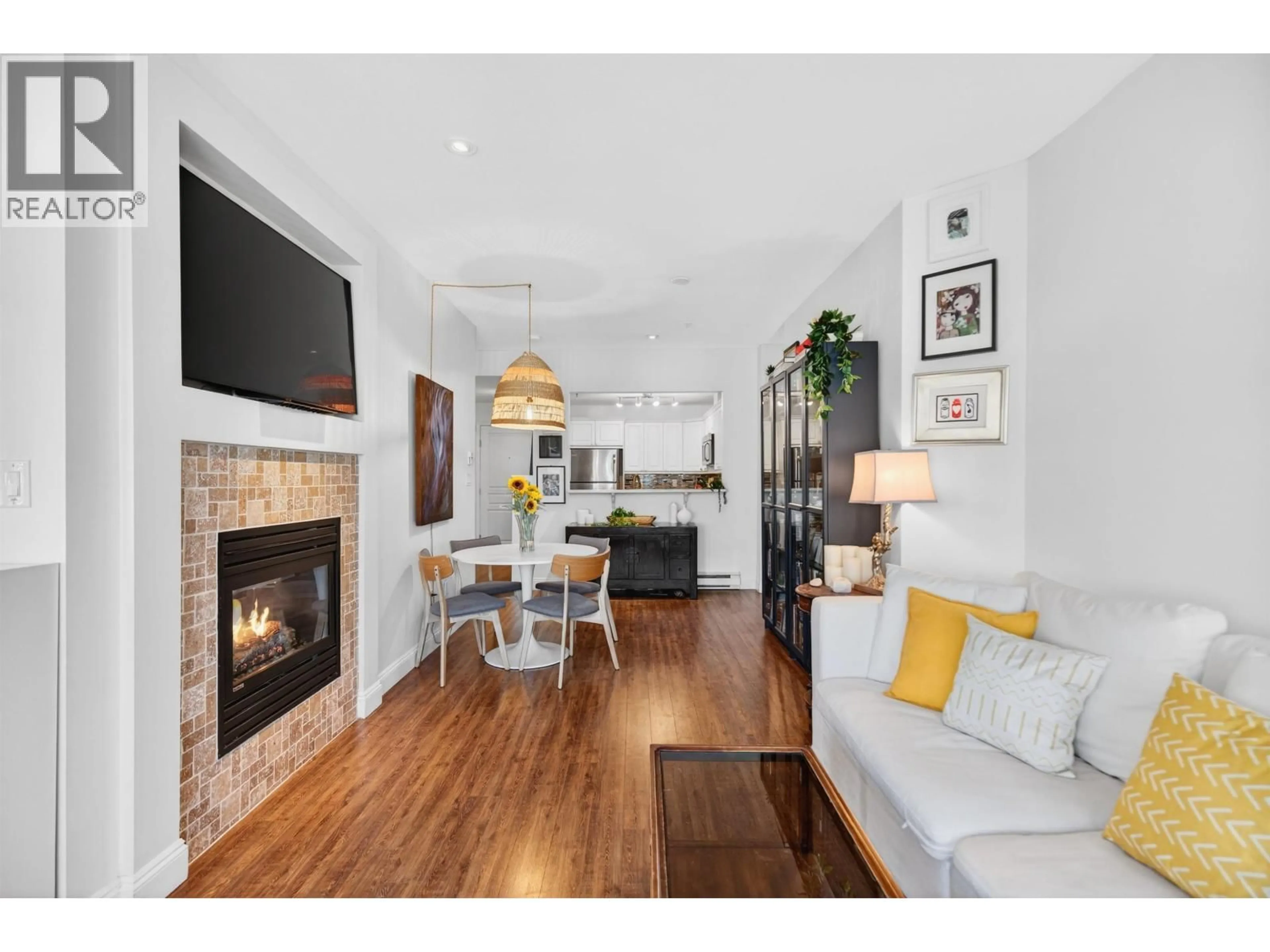 Living room with furniture, wood/laminate floor for 304 - 588 TWELFTH STREET, New Westminster British Columbia V3M4H9