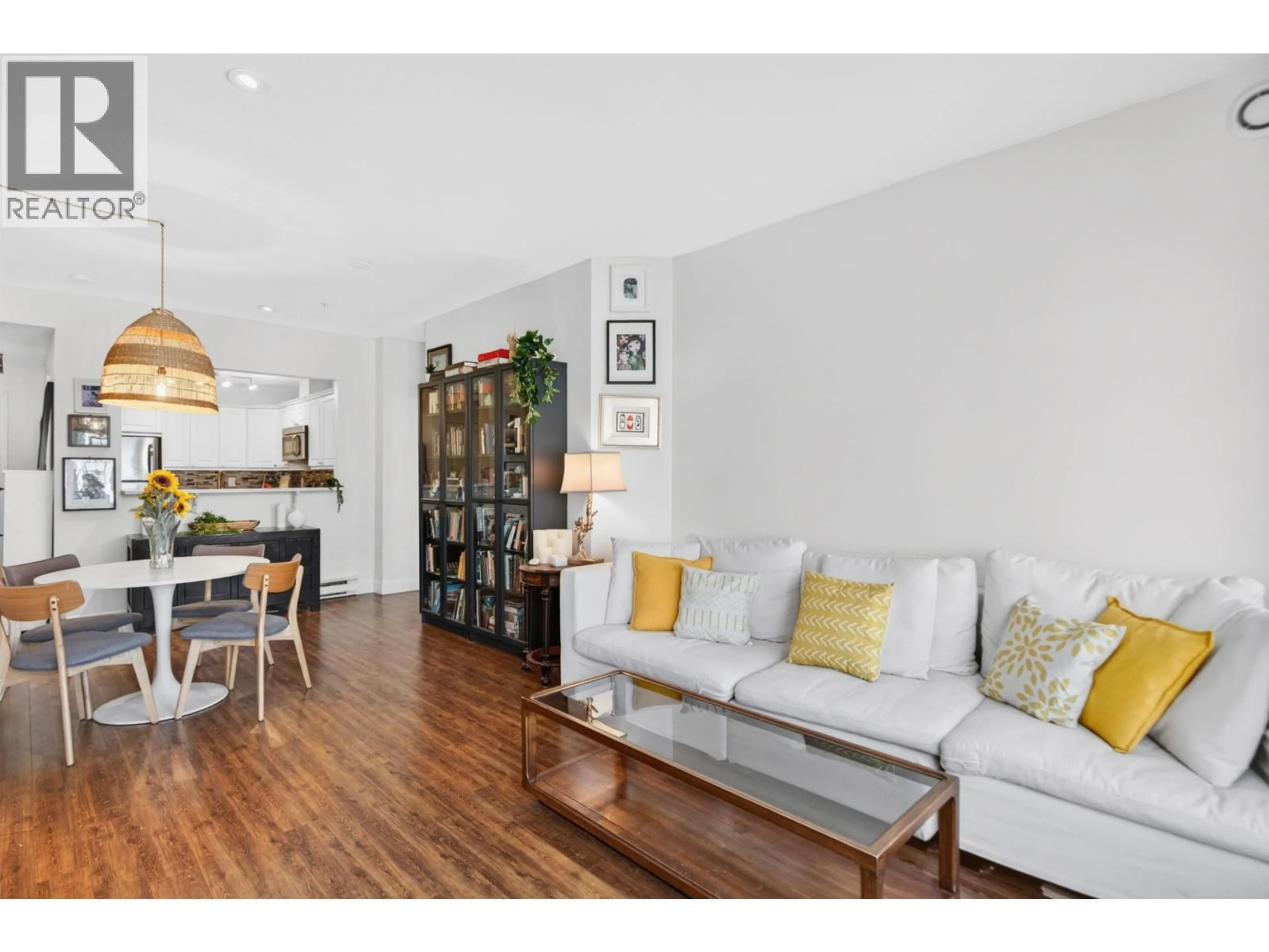 Living room with furniture, wood/laminate floor for 304 - 588 TWELFTH STREET, New Westminster British Columbia V3M4H9