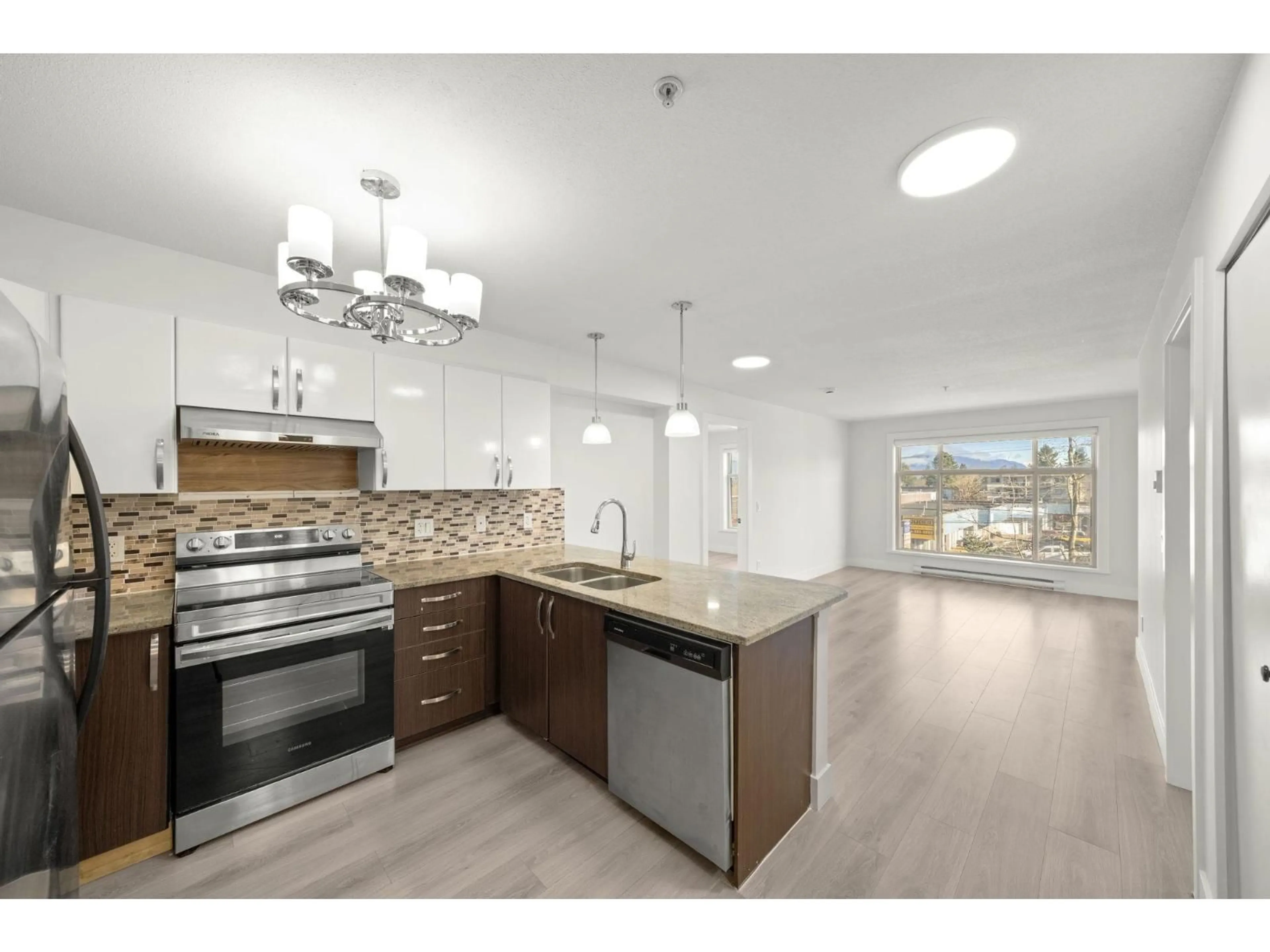 Open concept kitchen, unknown for 318 - 13555 GATEWAY DRIVE, Surrey British Columbia V3T0B5