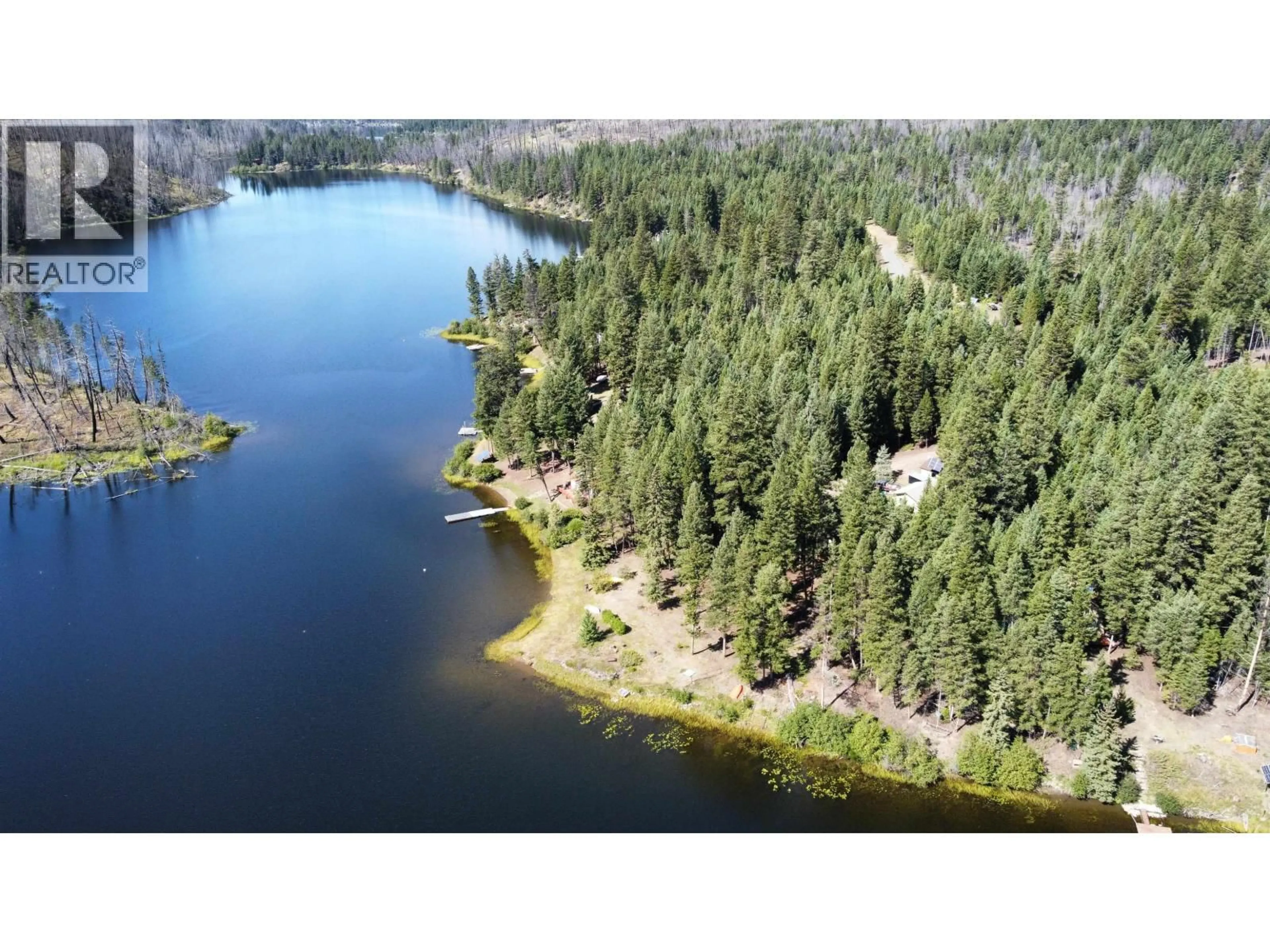 A pic from outside/outdoor area/front of a property/back of a property/a pic from drone, water/lake/river/ocean view for 7344 YOUNG LAKE ROAD, 70 Mile House British Columbia V0K2K2