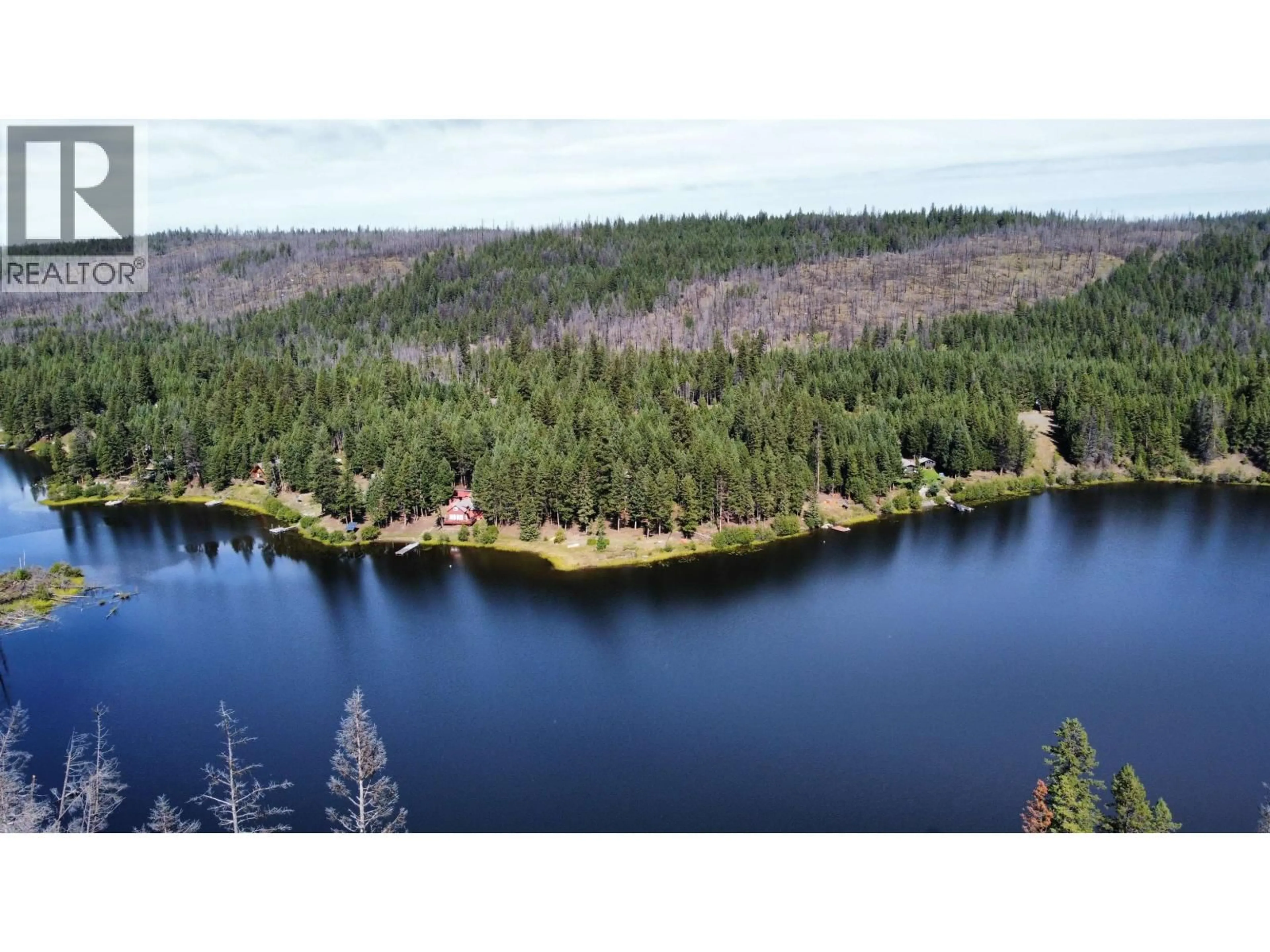 A pic from outside/outdoor area/front of a property/back of a property/a pic from drone, water/lake/river/ocean view for 7344 YOUNG LAKE ROAD, 70 Mile House British Columbia V0K2K2