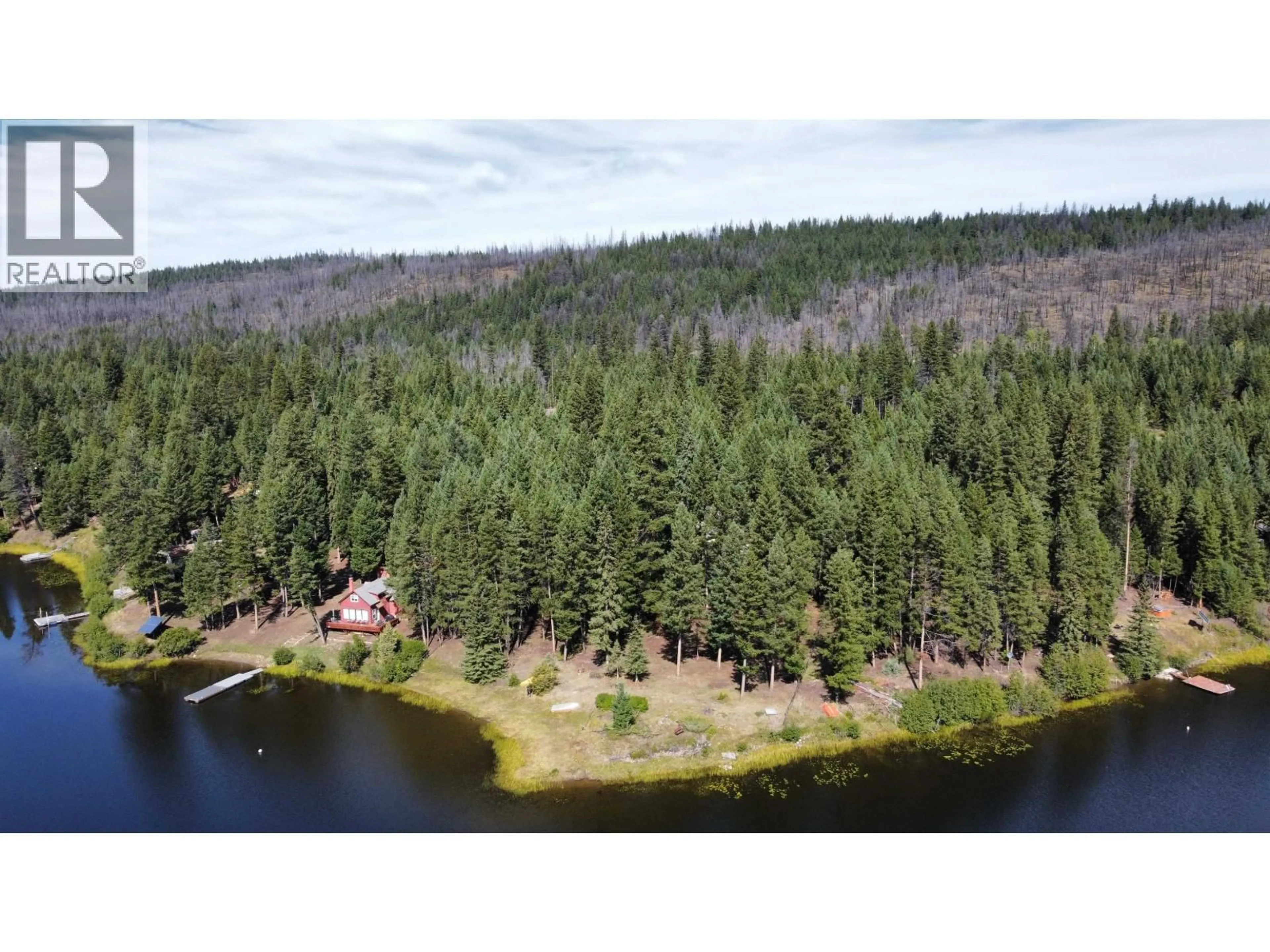 A pic from outside/outdoor area/front of a property/back of a property/a pic from drone, water/lake/river/ocean view for 7344 YOUNG LAKE ROAD, 70 Mile House British Columbia V0K2K2