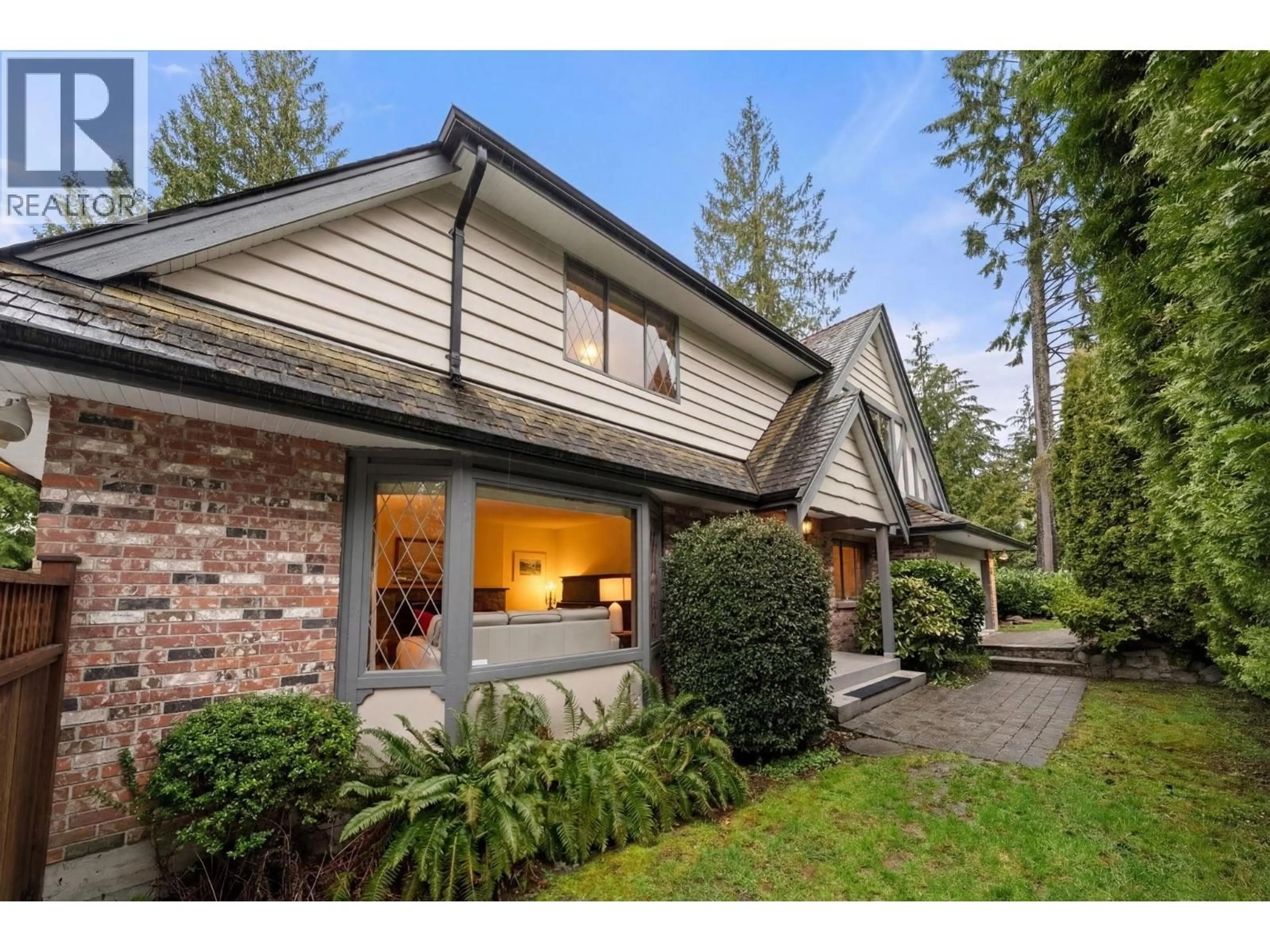 Home with brick exterior material, street for 4877 CEDARCREST AVENUE, North Vancouver British Columbia V7R3R6