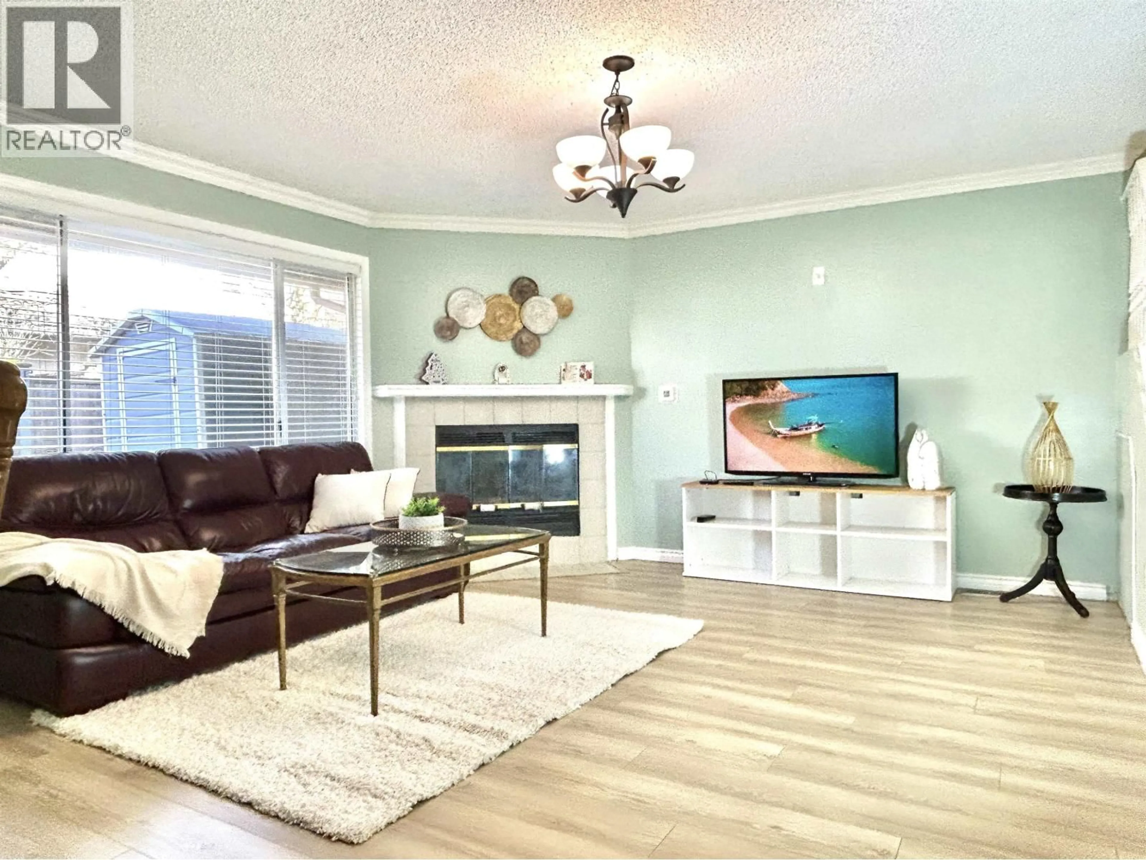 Living room with furniture, wood/laminate floor for 11 - 7871 FRANCIS ROAD, Richmond British Columbia V6Y3M4