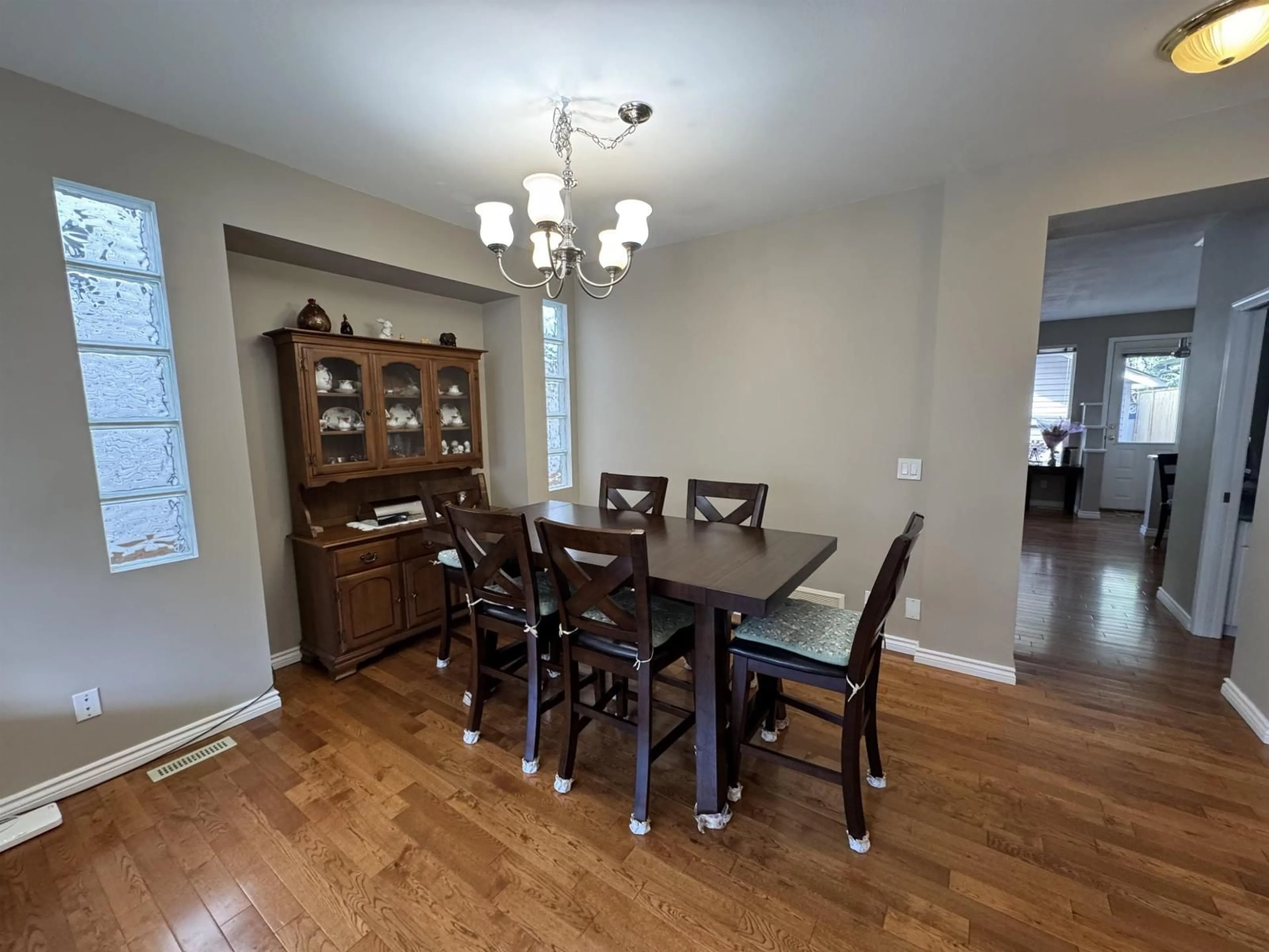Dining room, wood/laminate floor for 8780 206 STREET, Langley British Columbia V1M3X2