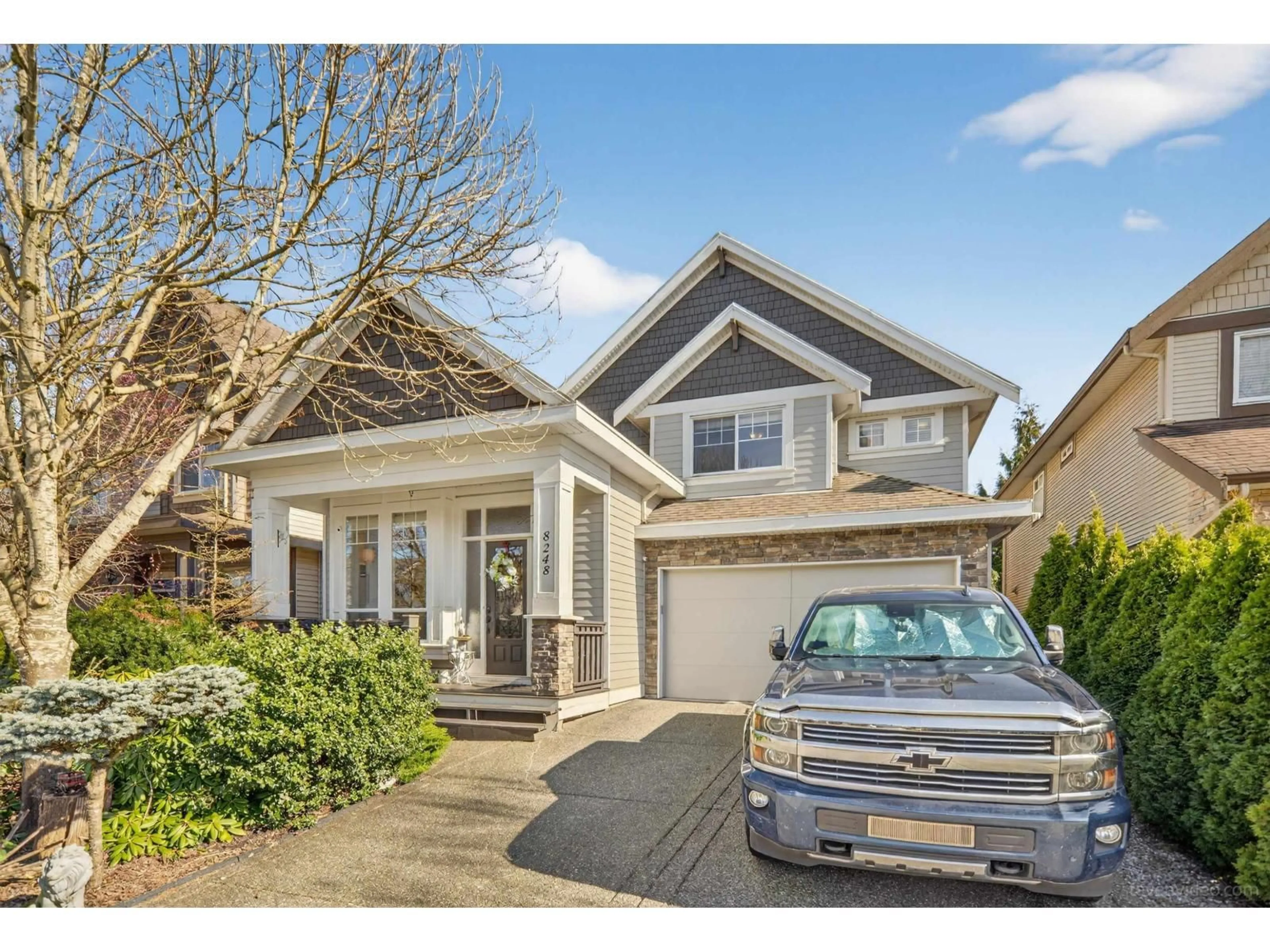 Home with vinyl exterior material, street for 8248 211 STREET, Langley British Columbia V2Y0E4