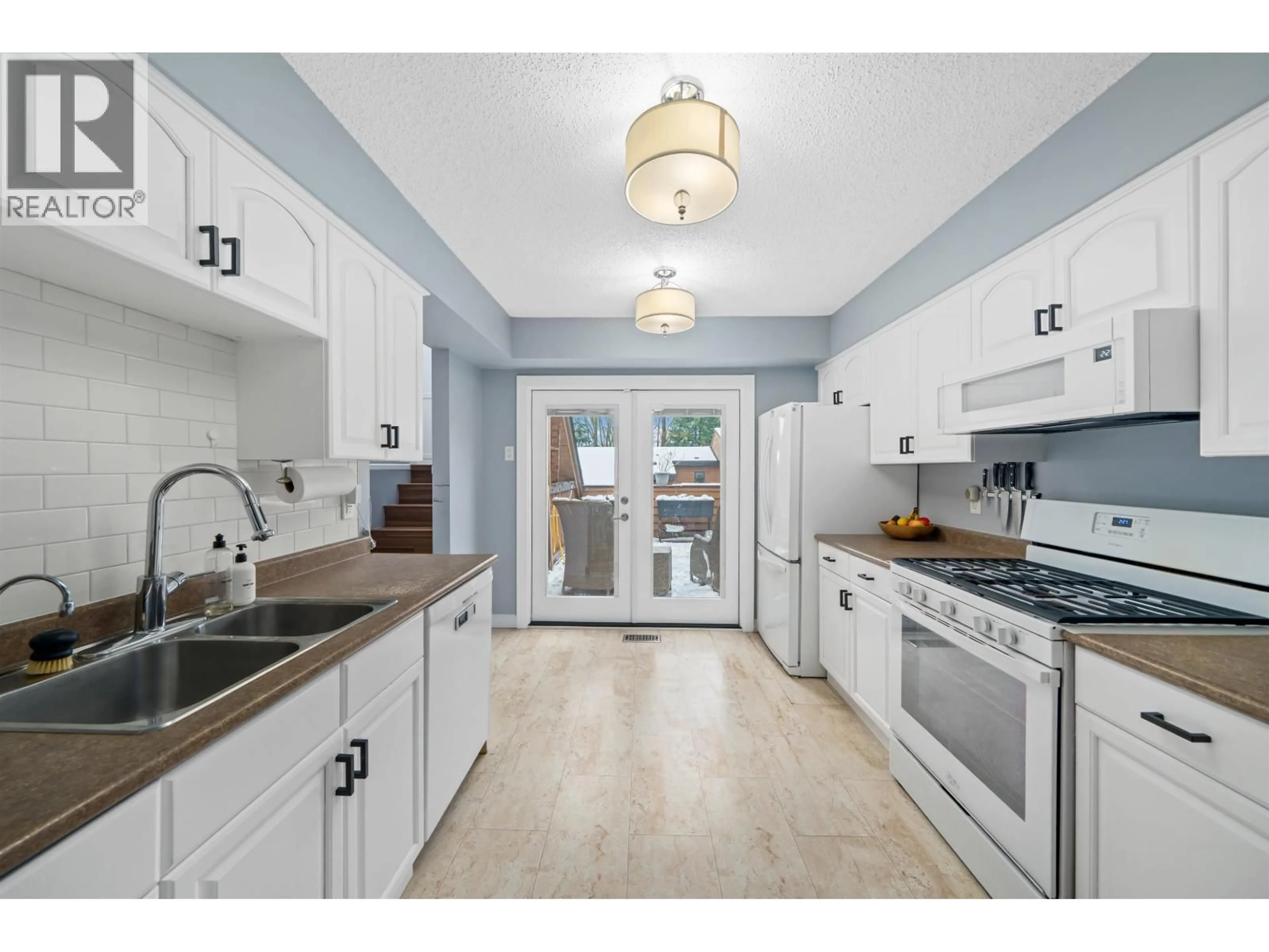 Open concept kitchen, unknown for 407 CAMBRIDGE WAY, Port Moody British Columbia V3H3V1