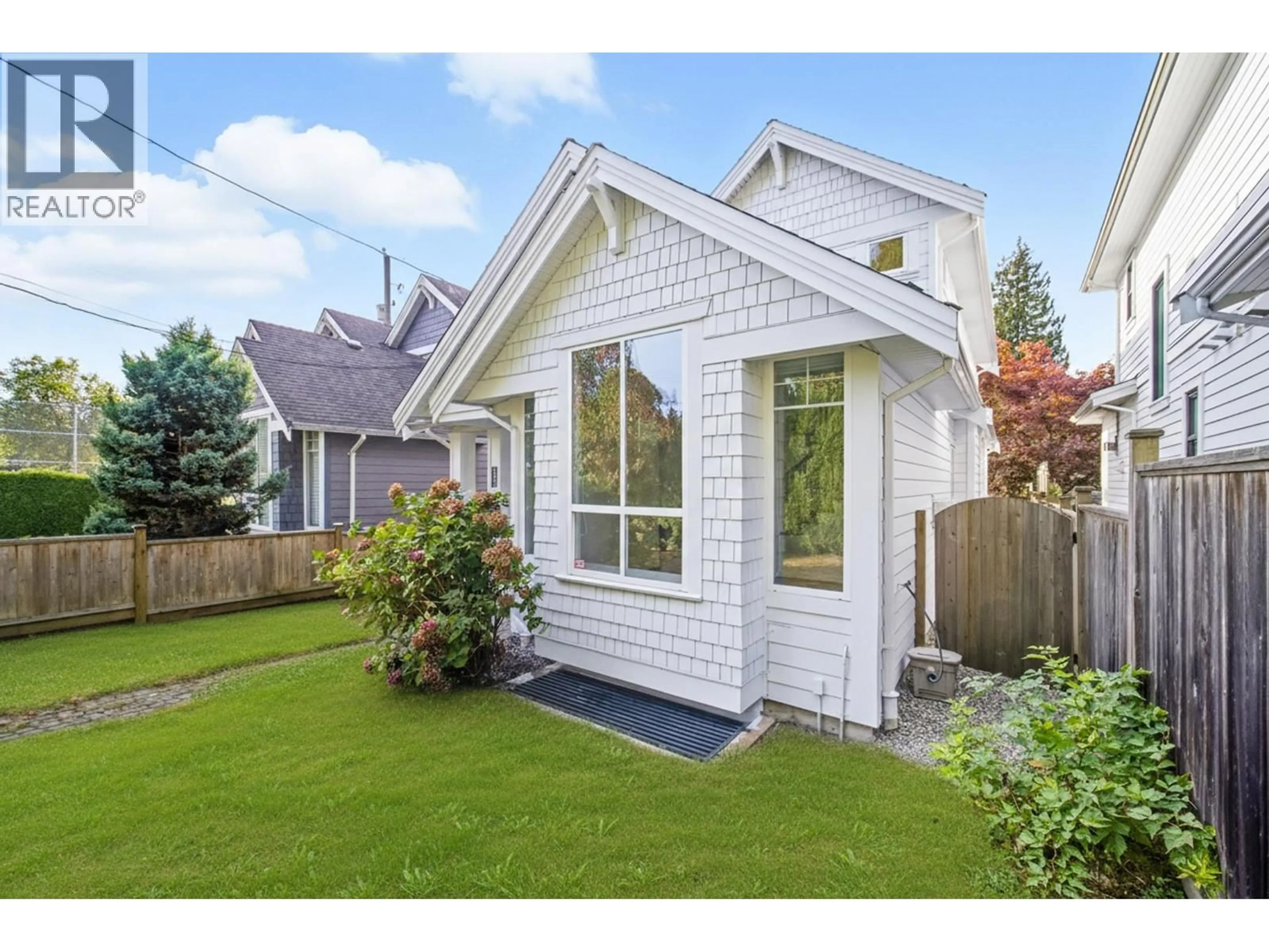 Home with vinyl exterior material, street for 2411 GEORGE STREET, North Vancouver British Columbia V7P2N4