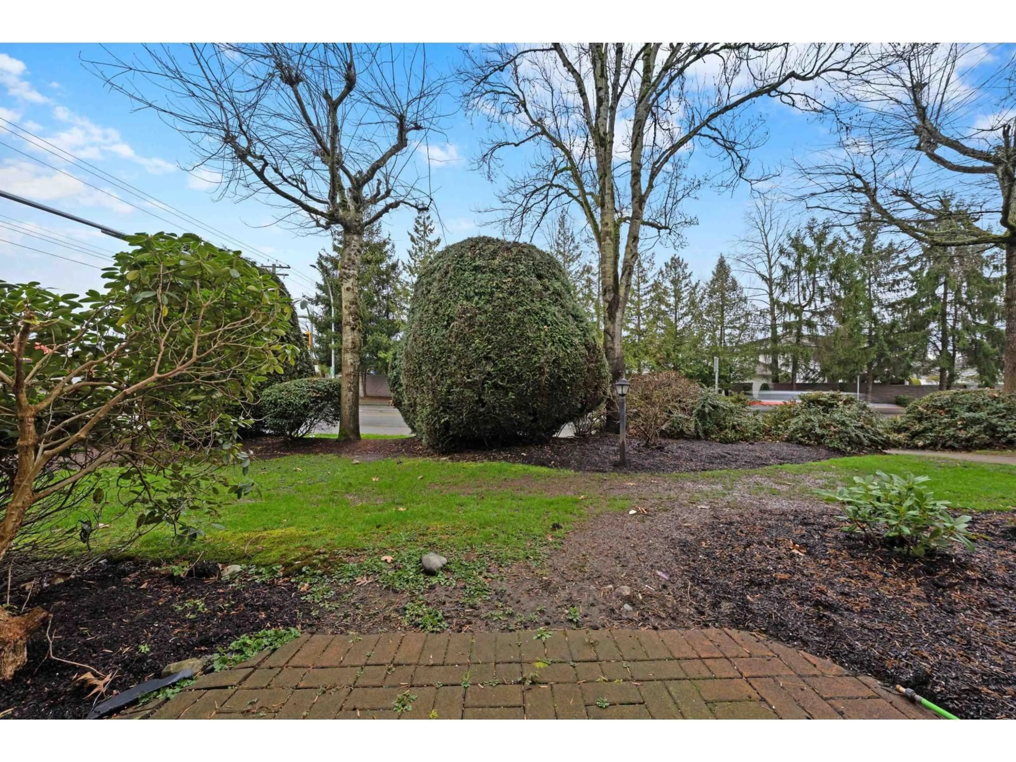 Patio, forest/trees view for 111 - 7171 121 STREET, Surrey British Columbia V3W1G9