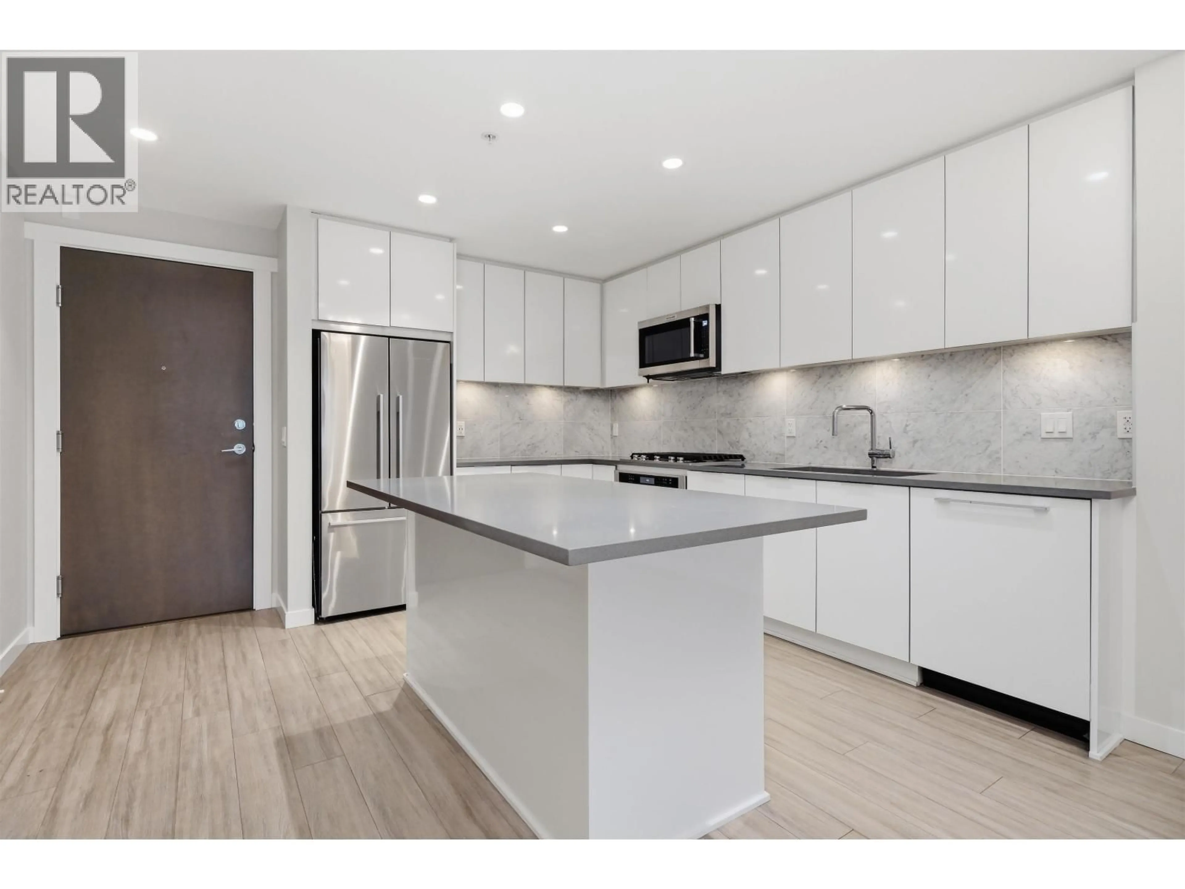 Open concept kitchen, unknown for 121 - 2651 LIBRARY LANE, North Vancouver British Columbia V7J0C1