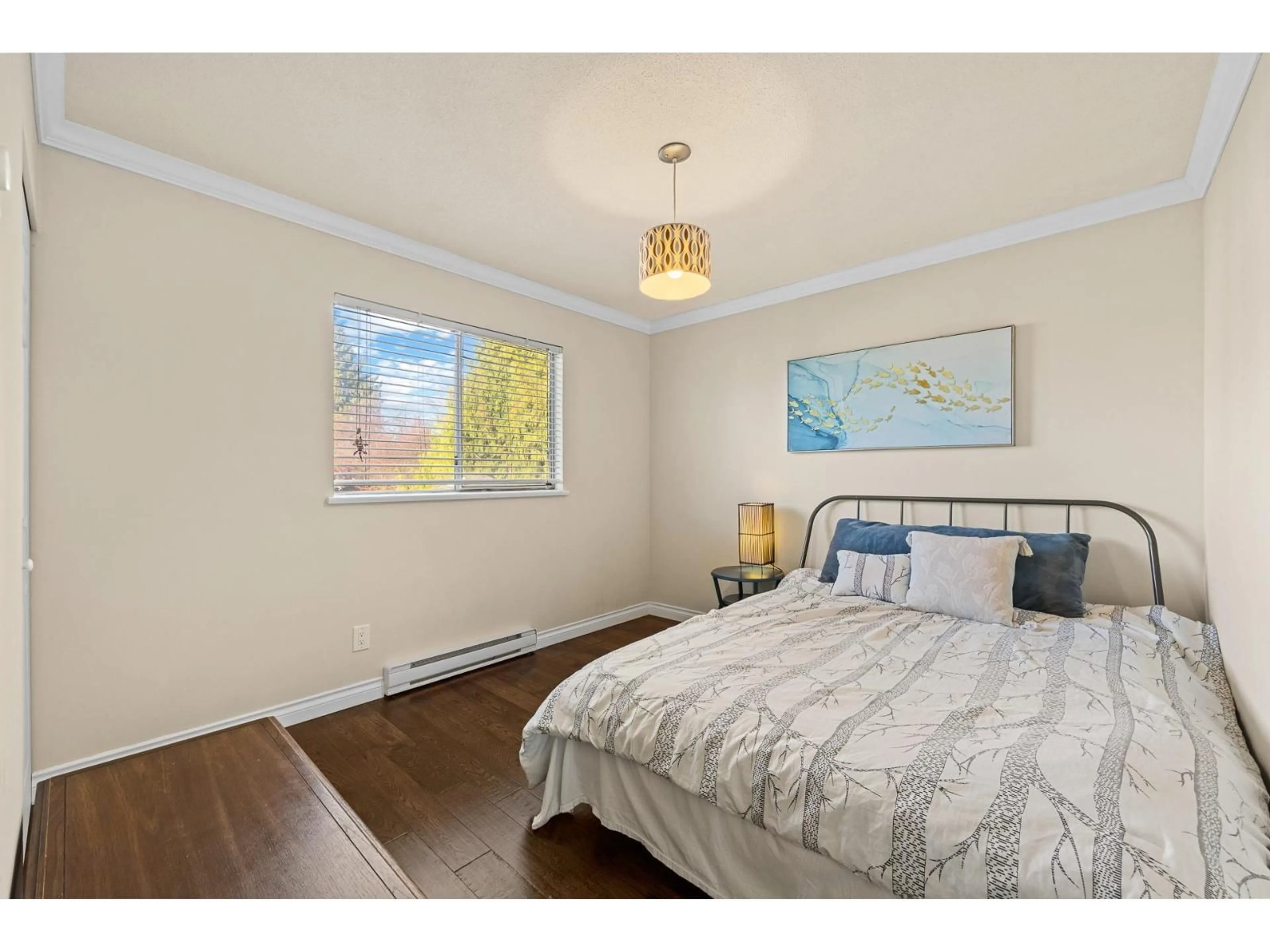 Bedroom with bed, wood/laminate floor for 1911 131 STREET, Surrey British Columbia V4A7P1