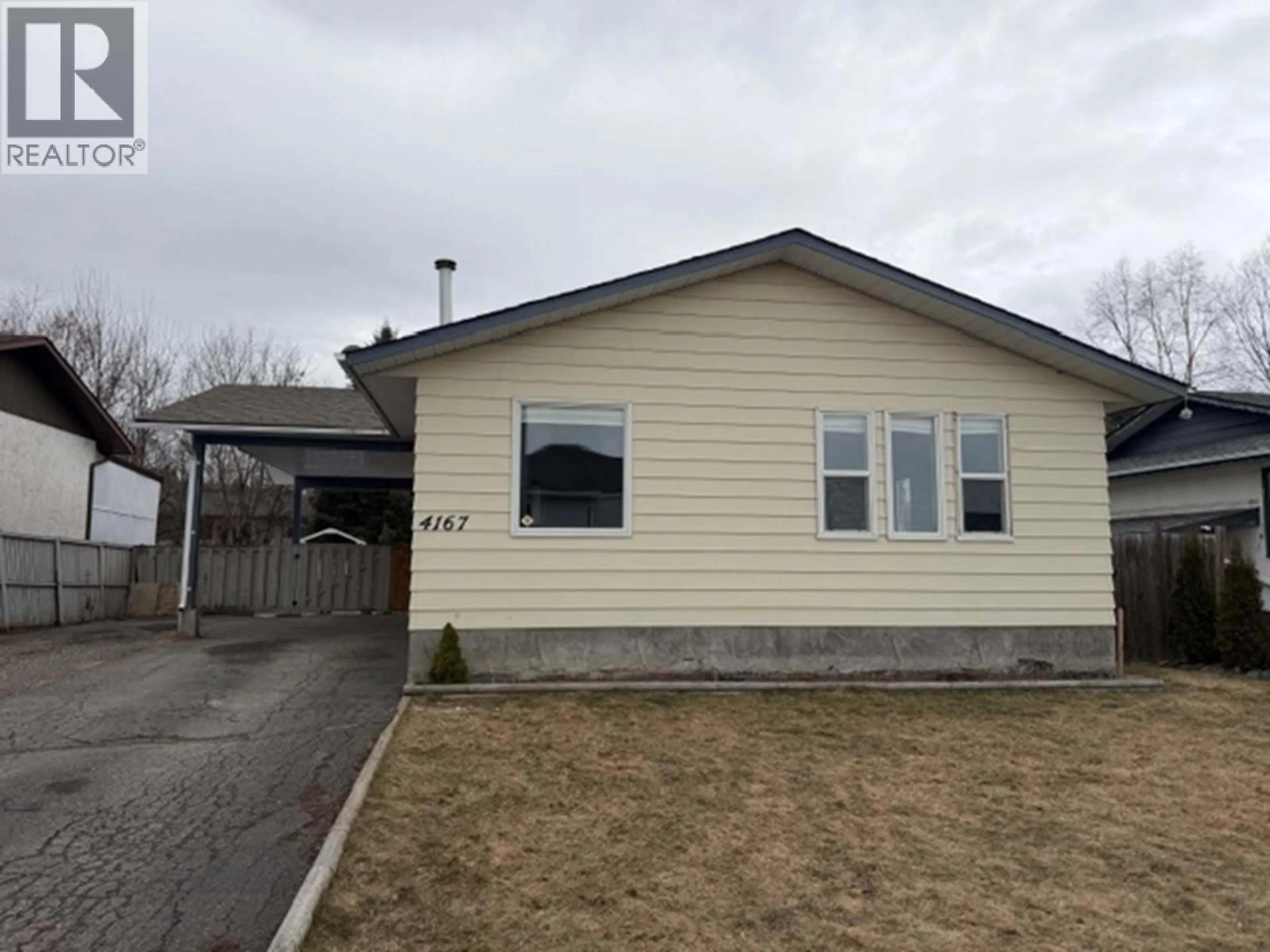 Home with vinyl exterior material, street for 4167 PRUDENTE ROAD, Prince George British Columbia V2N5K3