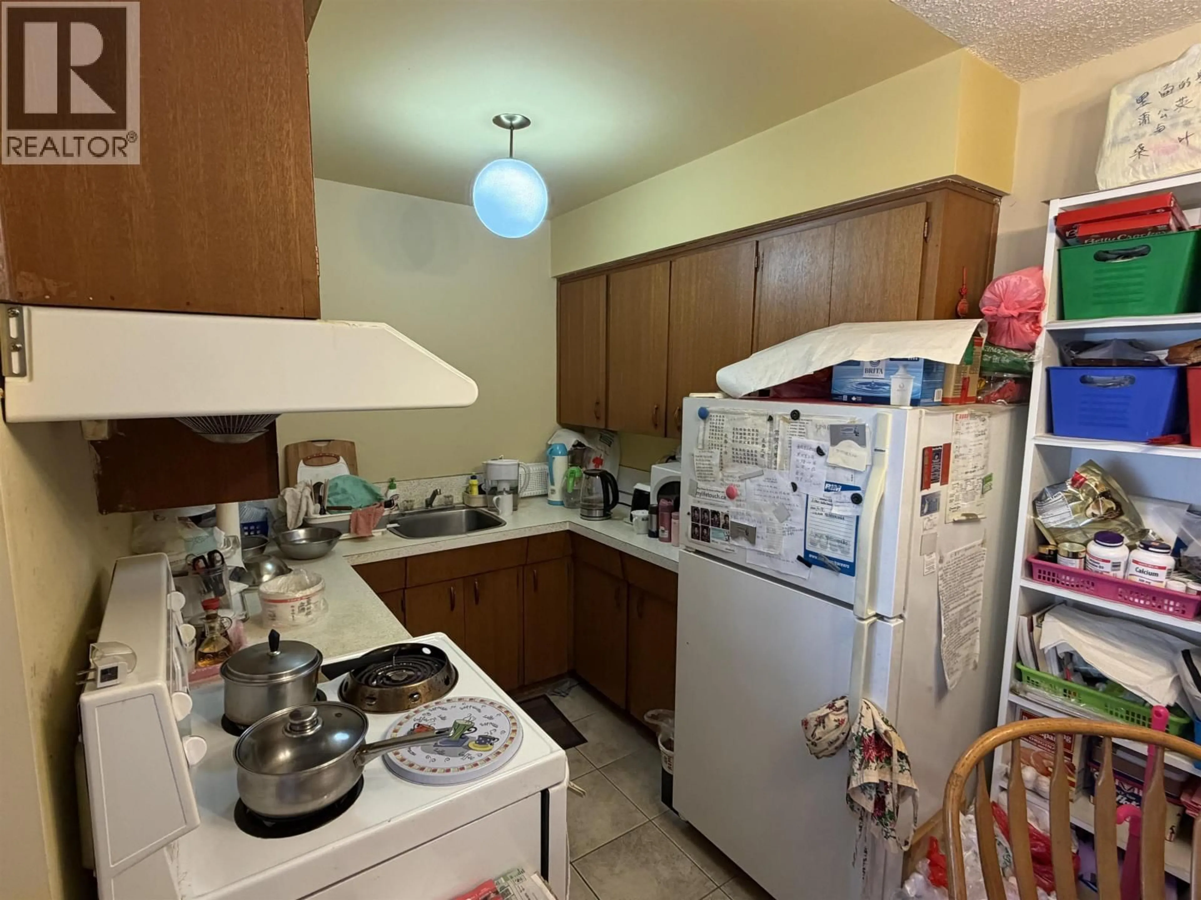 Standard kitchen, unknown for 205 - 5055 IMPERIAL STREET, Burnaby British Columbia V5J1C9