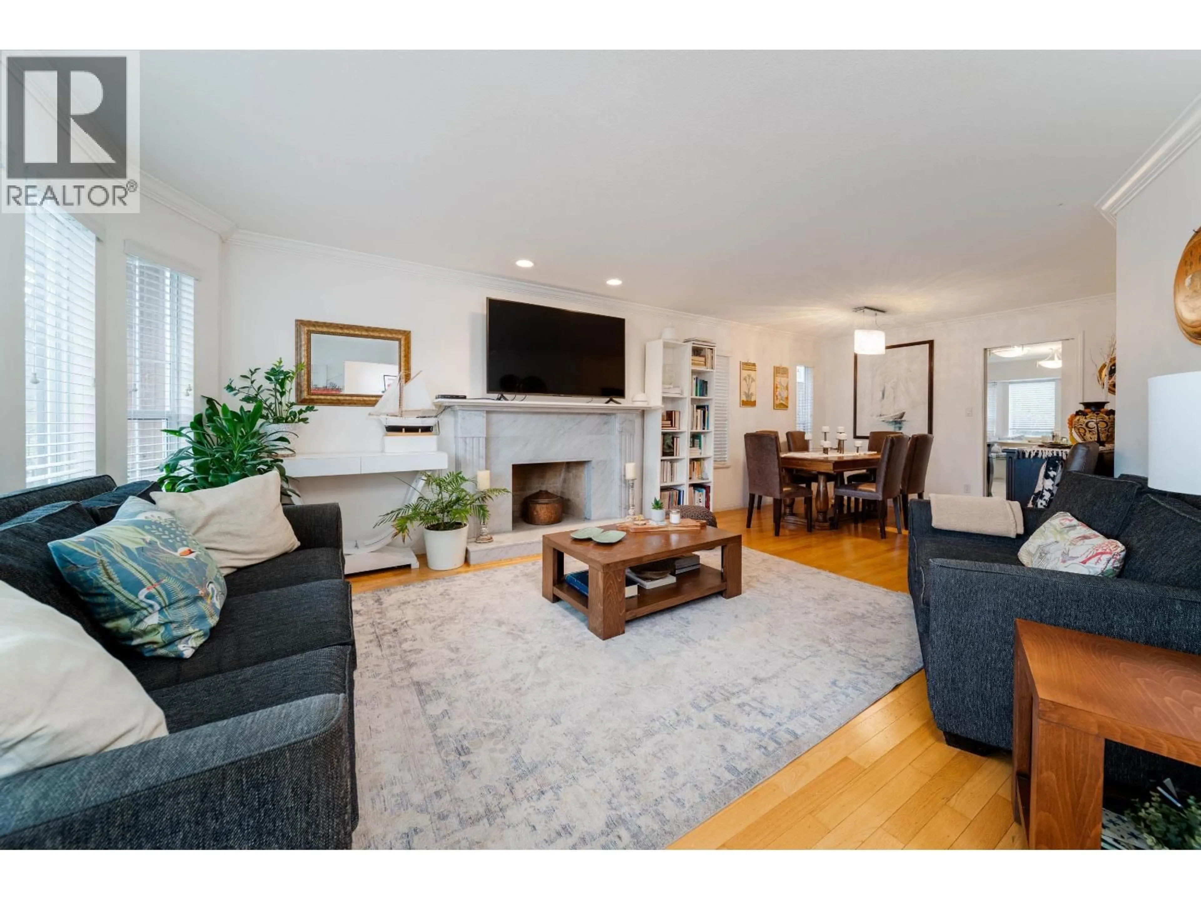 Living room with furniture, wood/laminate floor for 3528 10TH AVENUE, Vancouver British Columbia V6R2G1