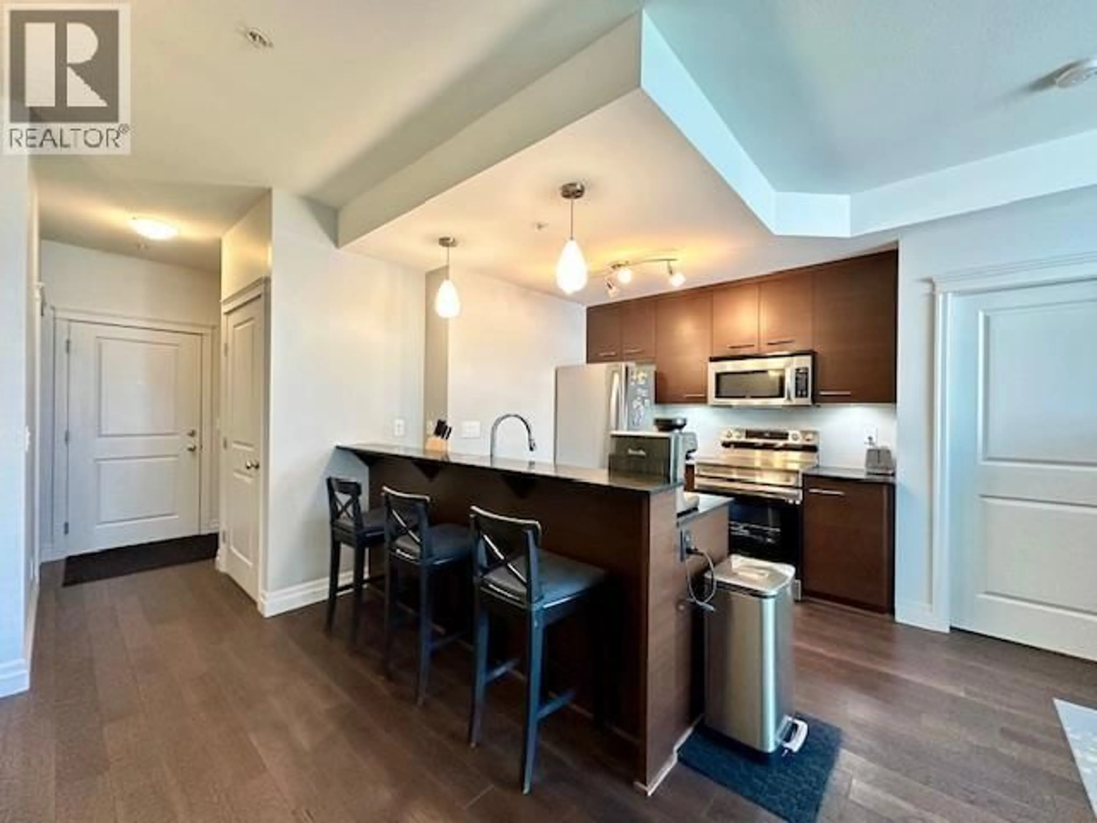 Open concept kitchen, wood/laminate floor for 301 - 2343 ATKINS AVENUE, Port Coquitlam British Columbia V3C1Y7