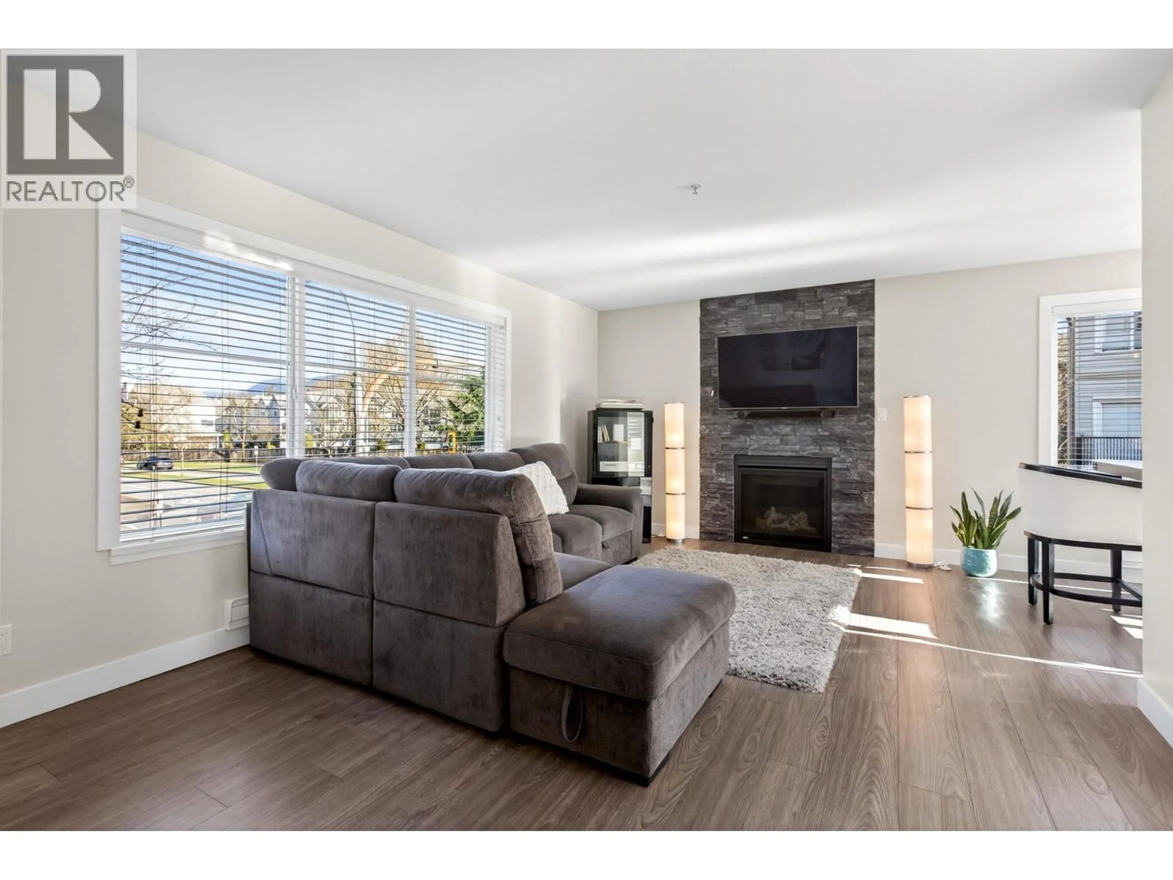 Living room with furniture, unknown for 20 - 2488 PITT RIVER ROAD, Port Coquitlam British Columbia V3C1R9