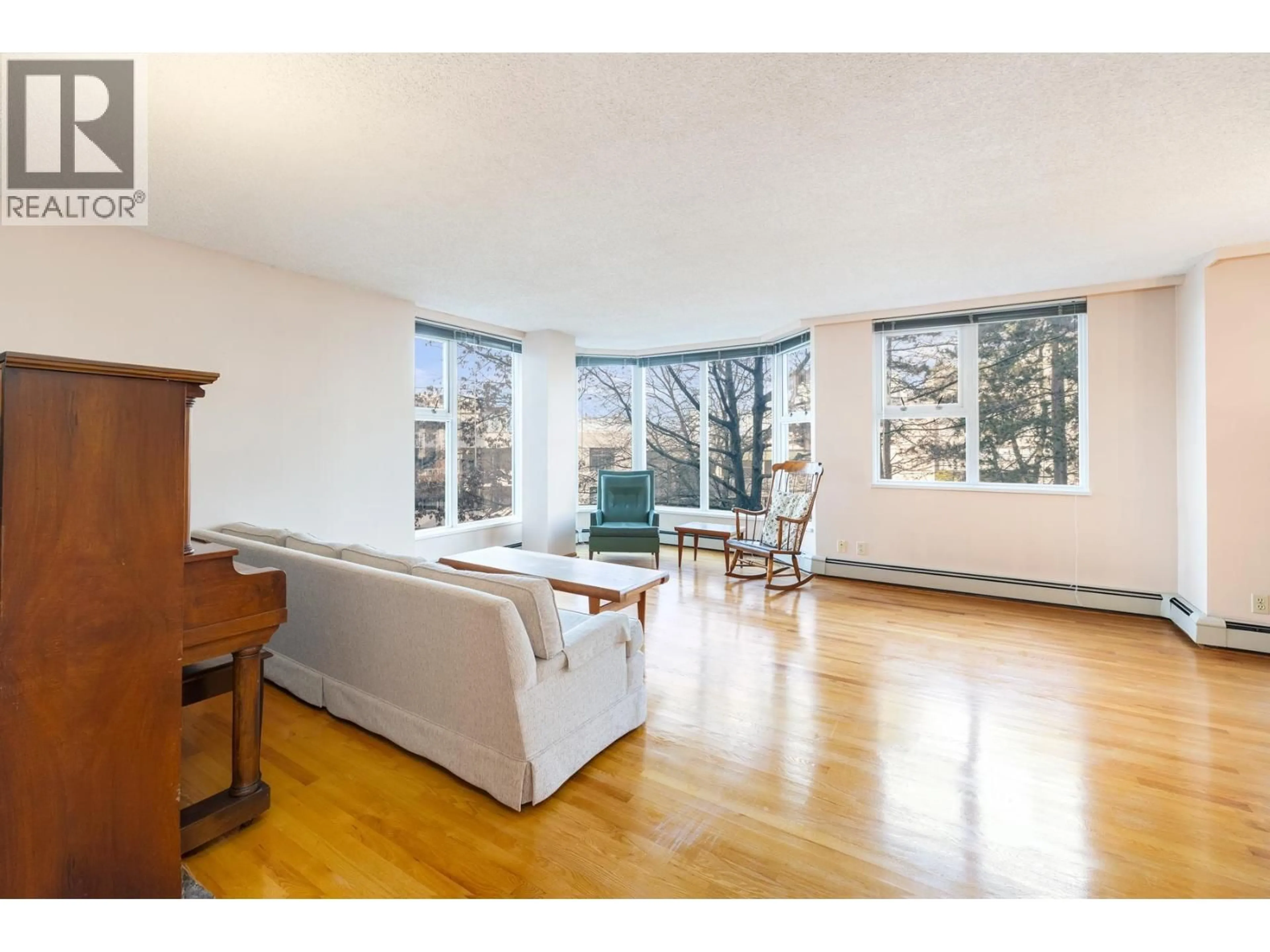 Living room with furniture, unknown for 404 - 522 MOBERLY ROAD, Vancouver British Columbia V5Z4G4