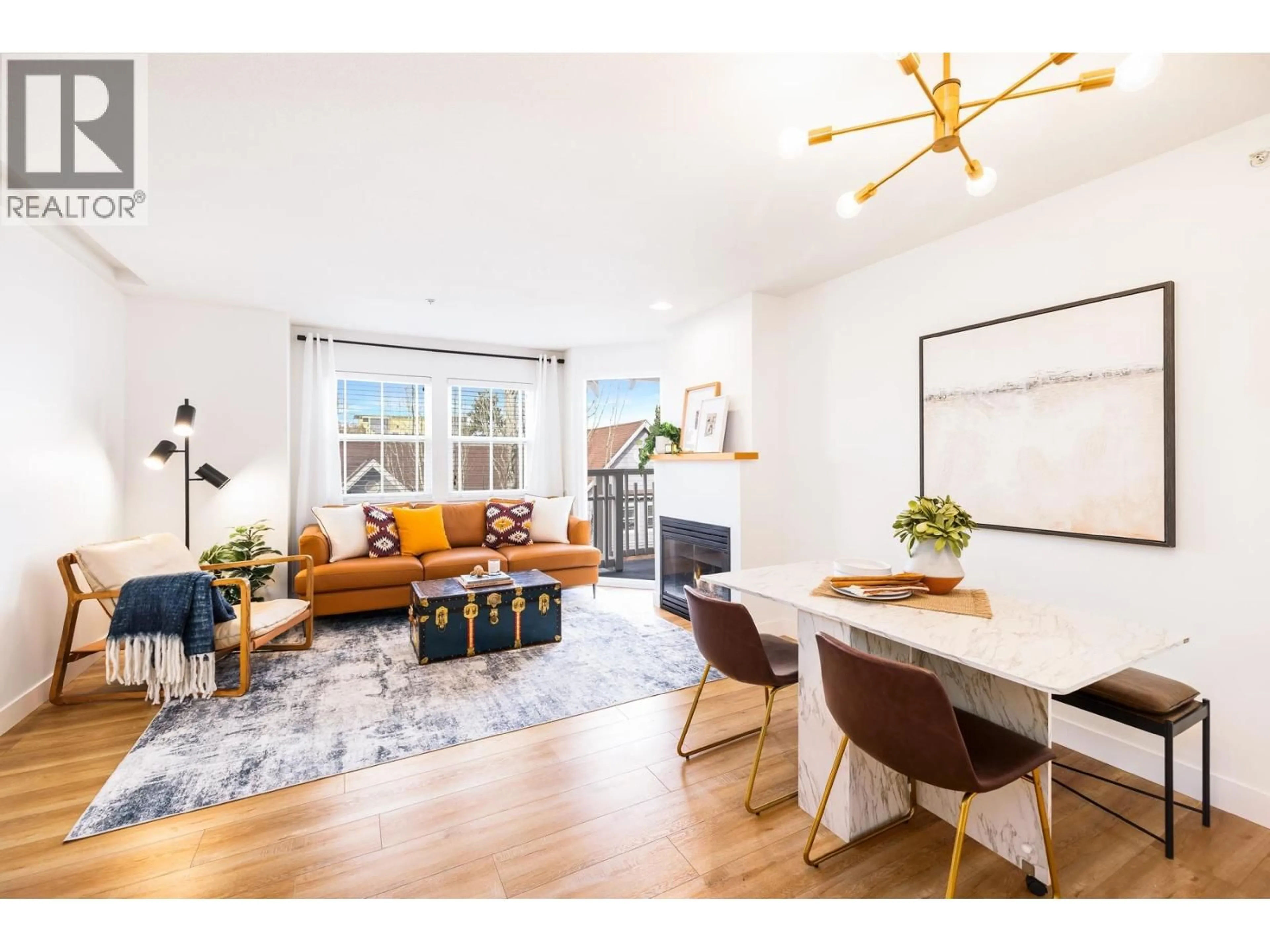 Living room with furniture, wood/laminate floor for PH10 - 1702 56 STREET, Tsawwassen British Columbia V4L2P5