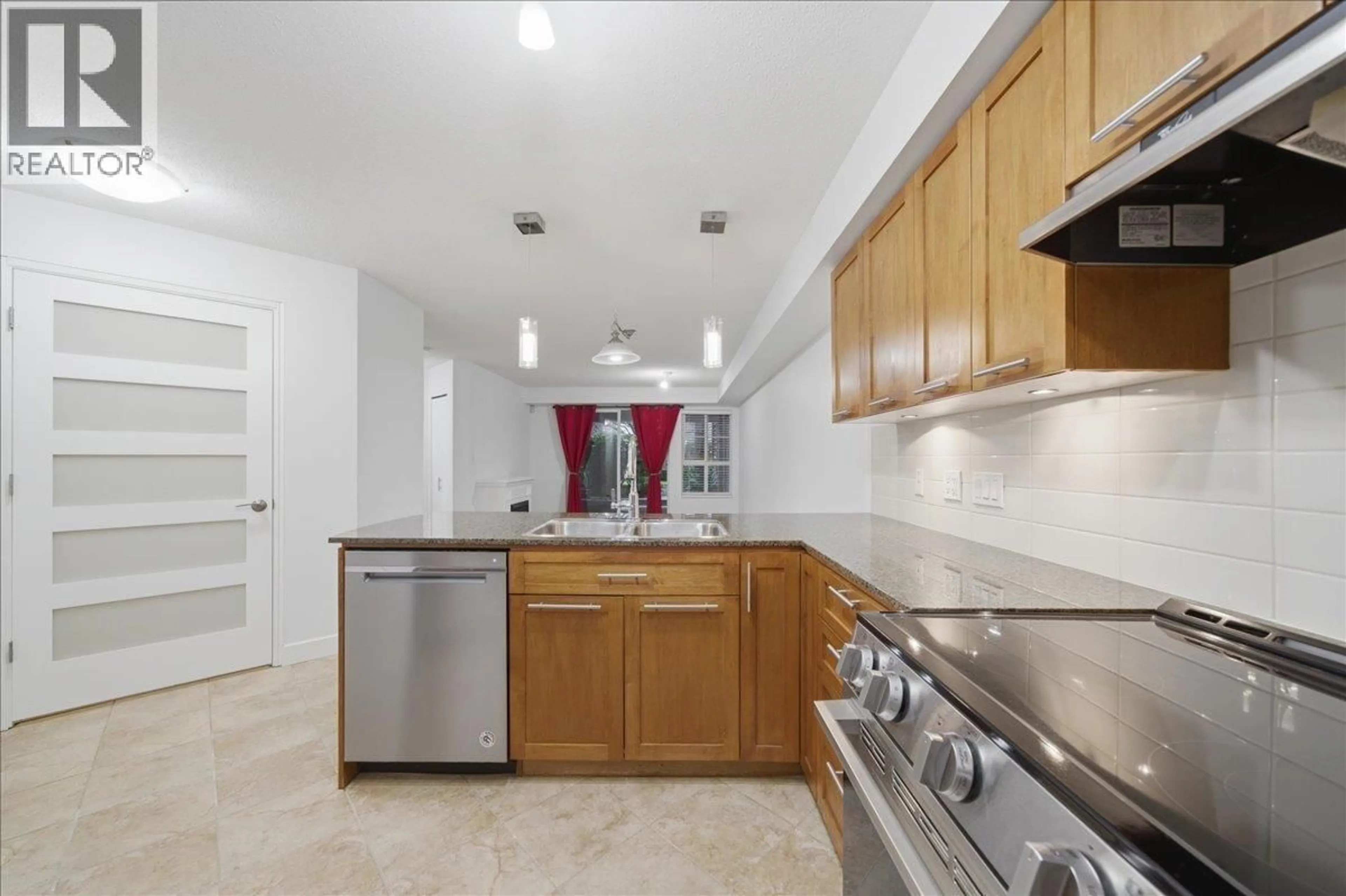 Standard kitchen, ceramic/tile floor for 103 - 19673 MEADOW GARDENS WAY, Pitt Meadows British Columbia V3Y0A1