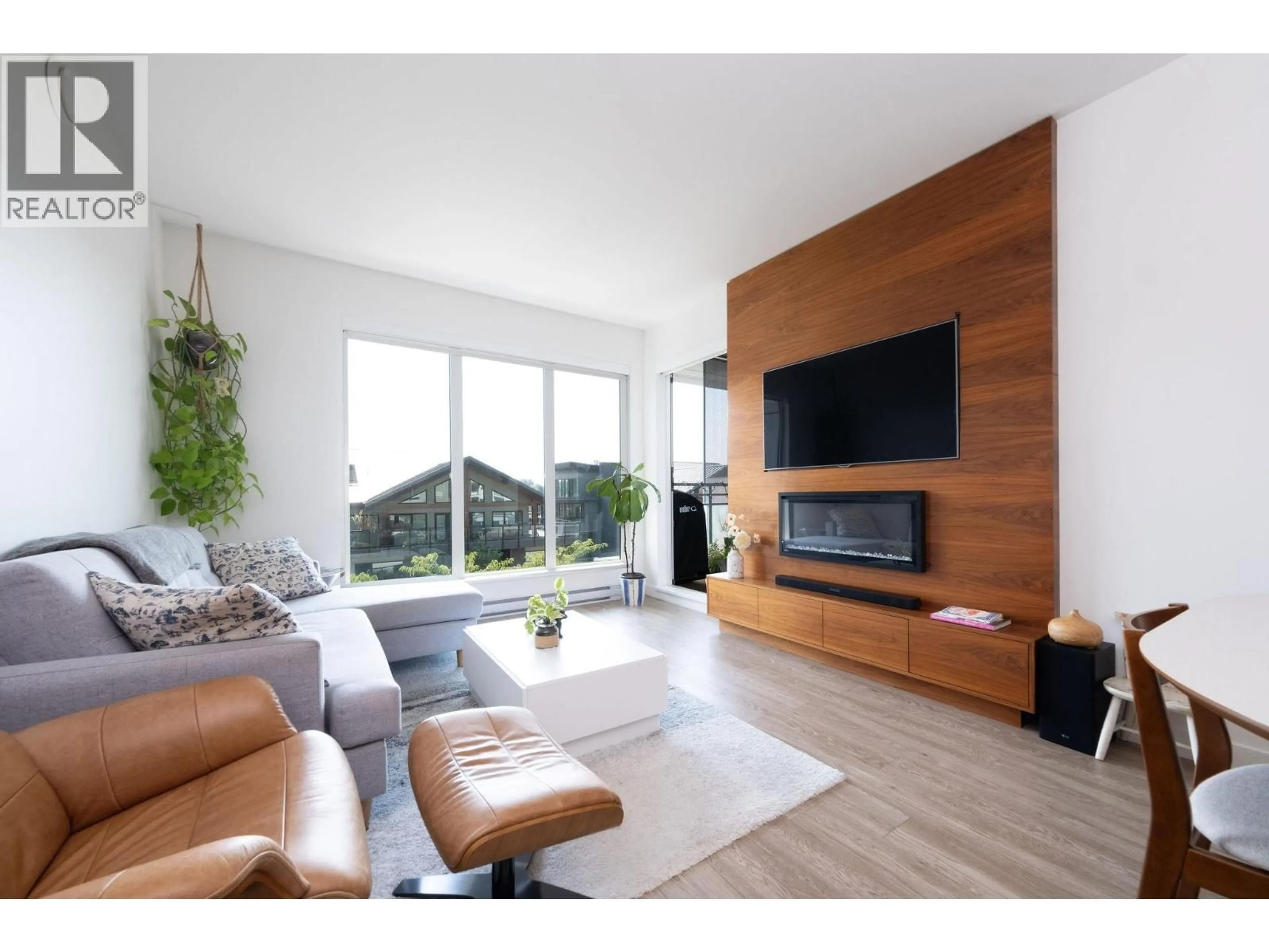 Living room with furniture, wood/laminate floor for 404 - 1061 MARINE DRIVE, North Vancouver British Columbia V7P1S6