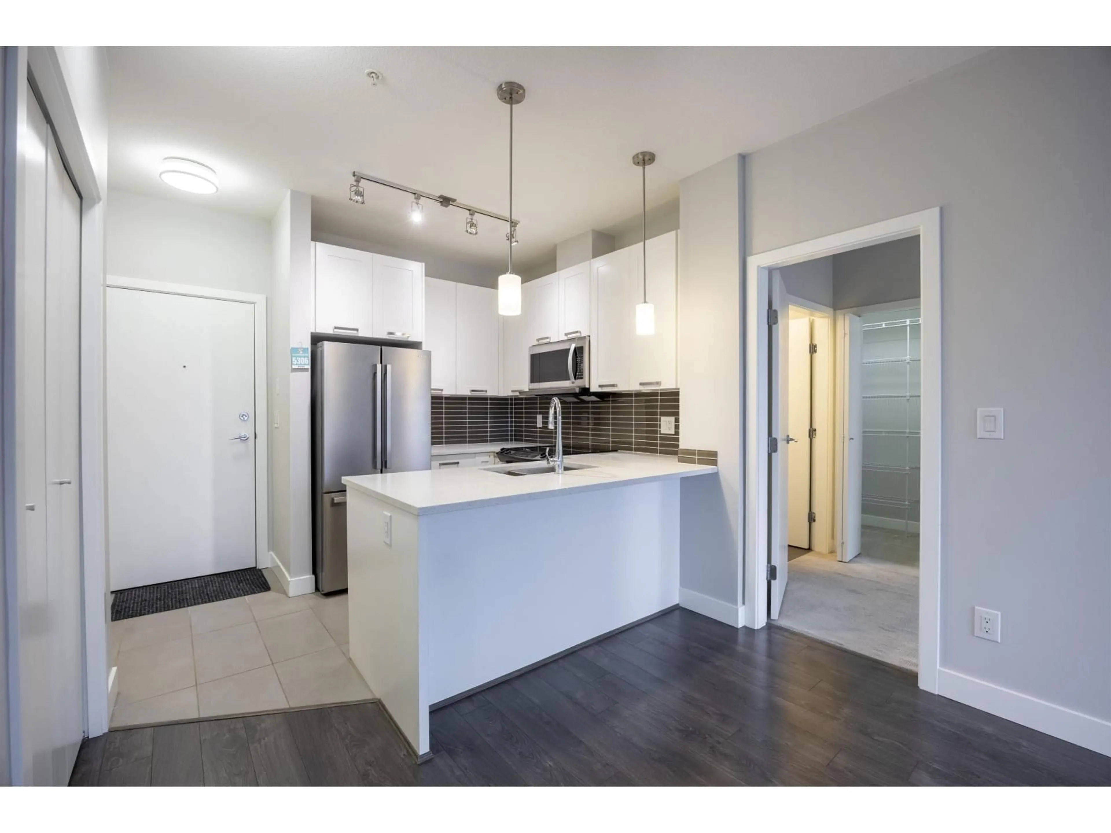 Open concept kitchen, unknown for 306 - 10455 154 STREET, Surrey British Columbia V3R0C5