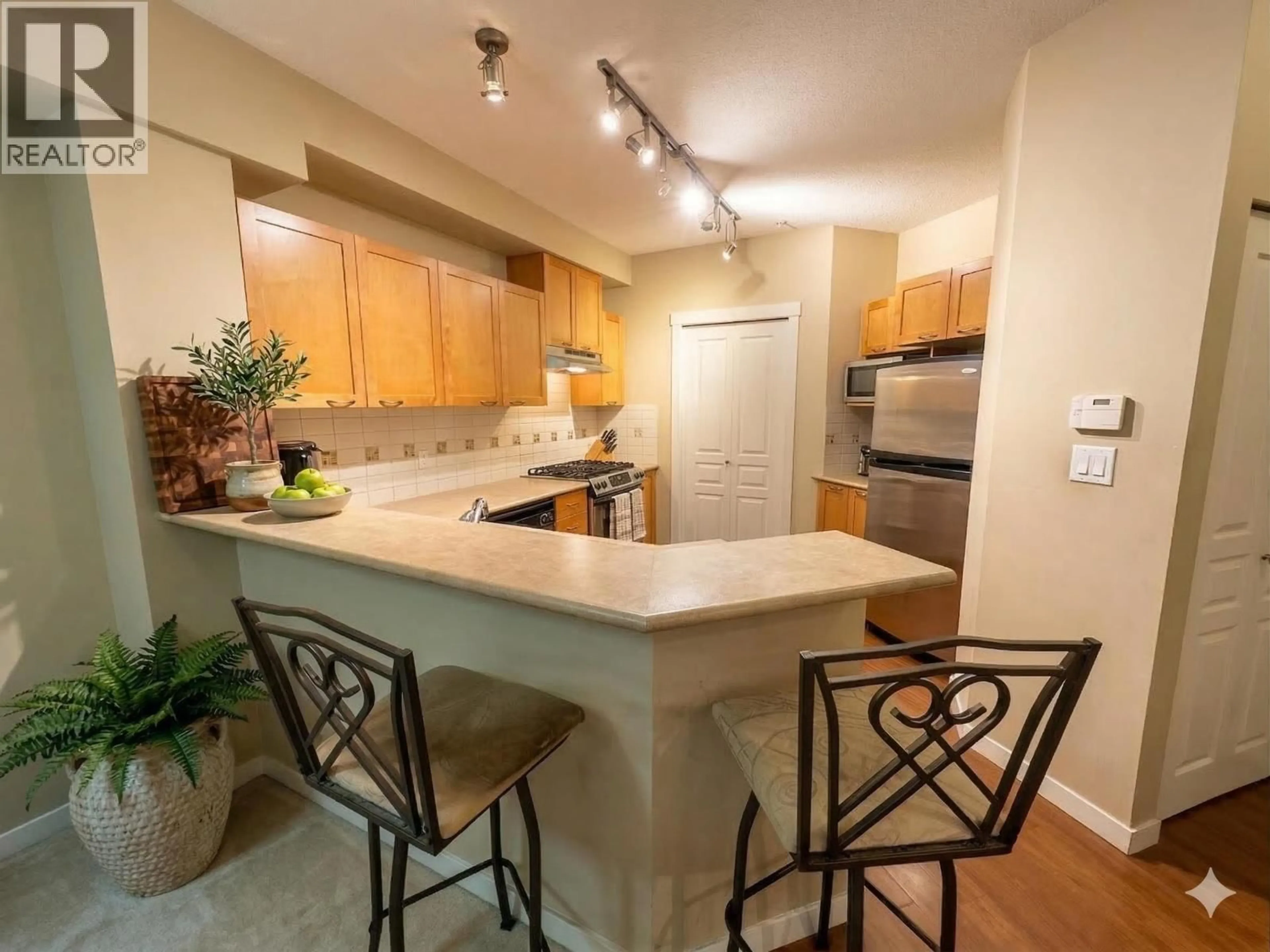 Open concept kitchen, unknown for 111 - 2969 WHISPER WAY, Coquitlam British Columbia V3E3S8
