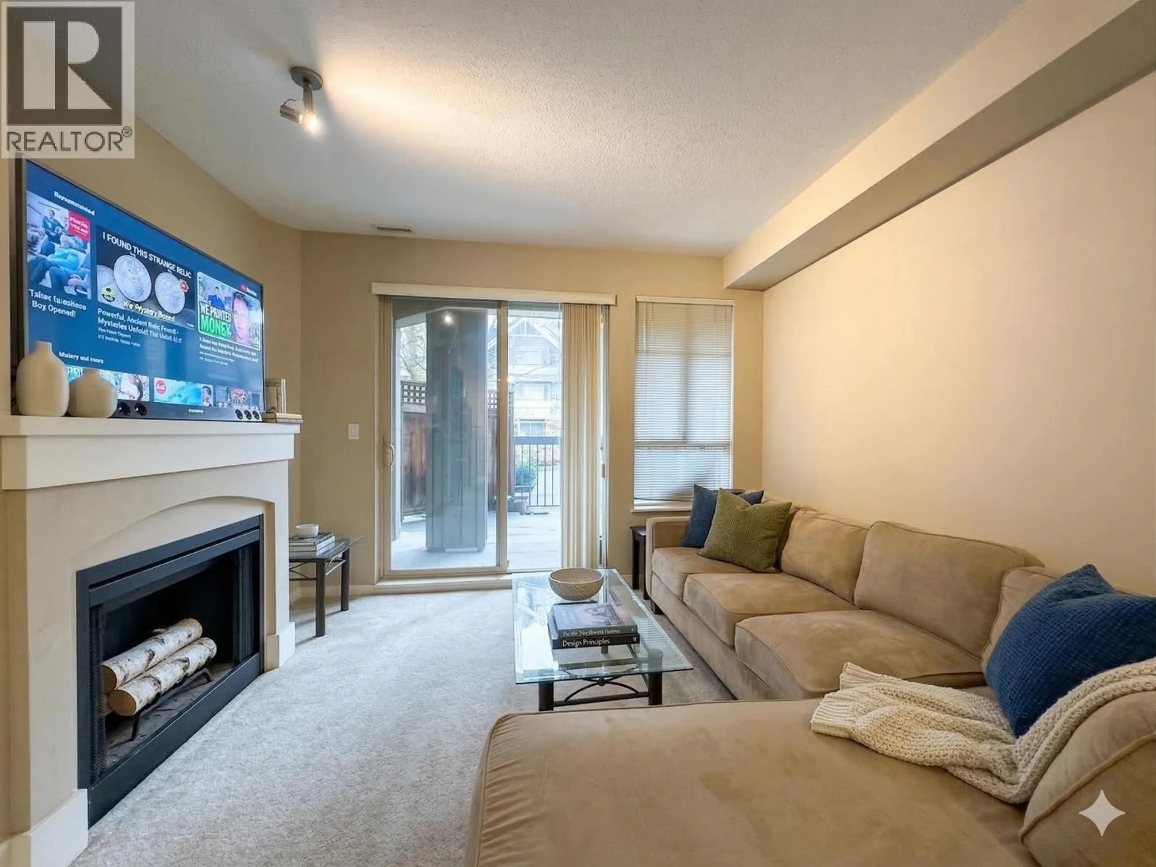Living room with furniture, unknown for 111 - 2969 WHISPER WAY, Coquitlam British Columbia V3E3S8