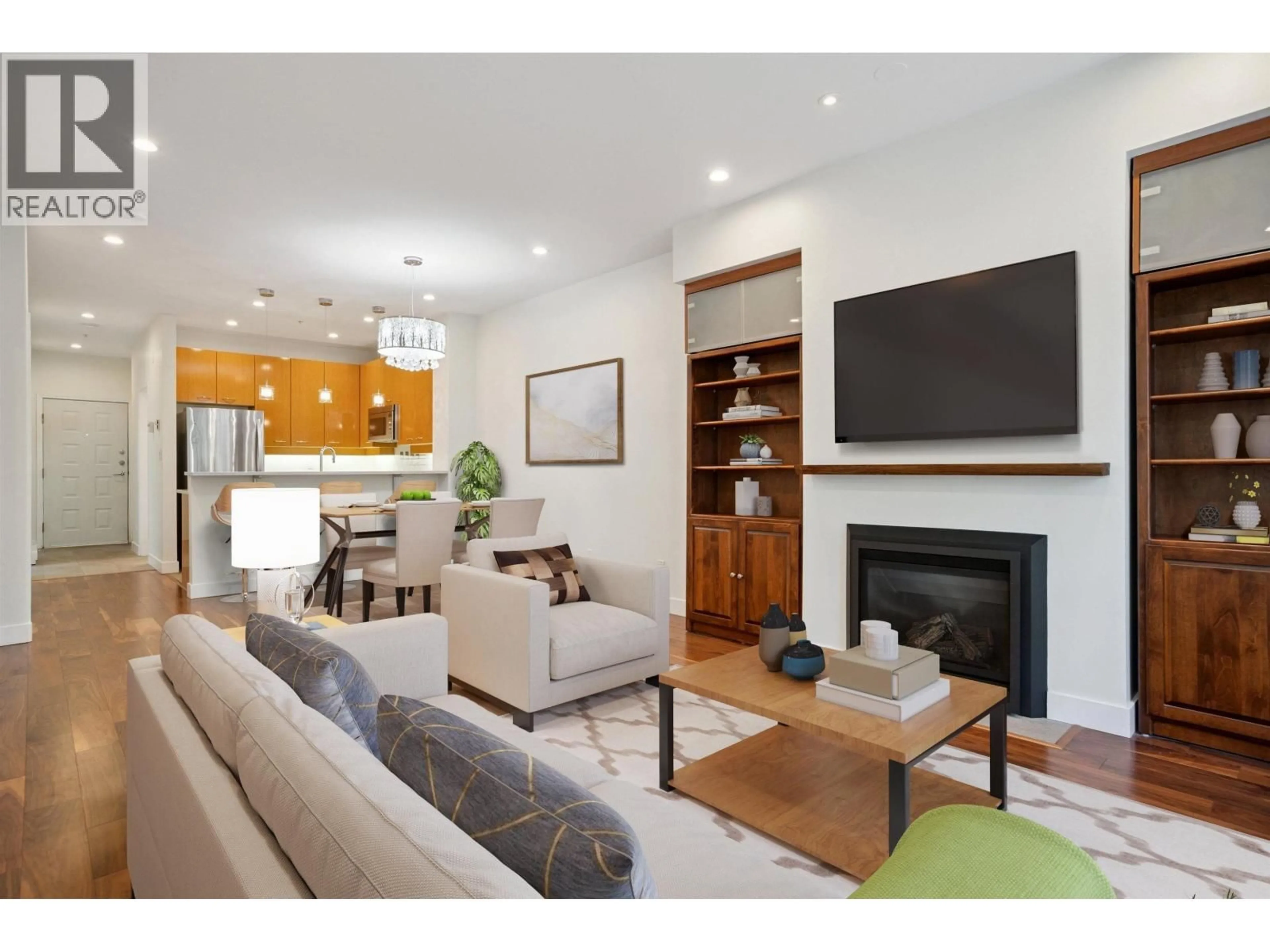 Living room with furniture, wood/laminate floor for 210 - 2028 11 AVENUE, Vancouver British Columbia V6J2C9