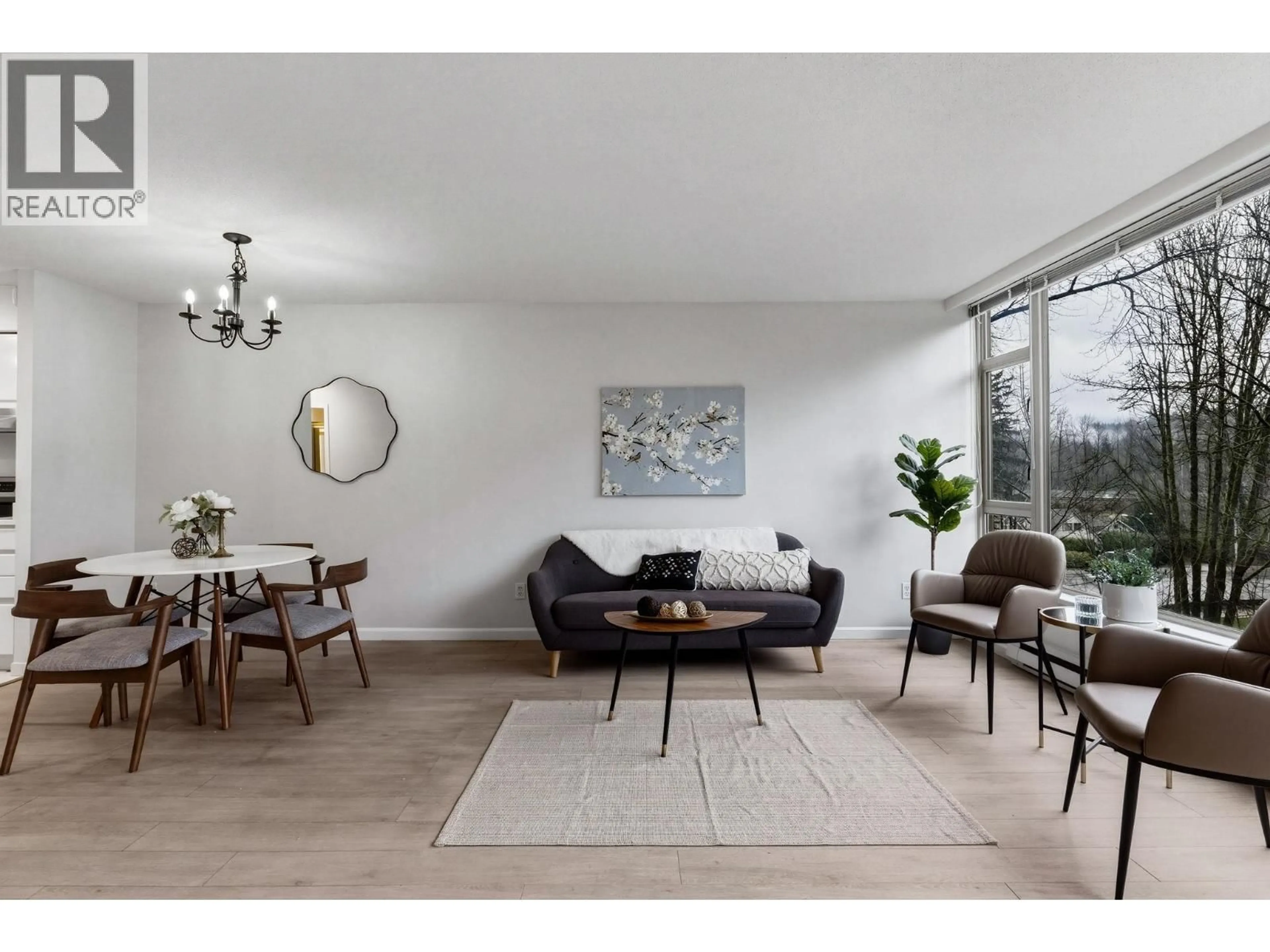 Living room with furniture, wood/laminate floor for 509 - 1327 KEITH ROAD, North Vancouver British Columbia V7J3T5