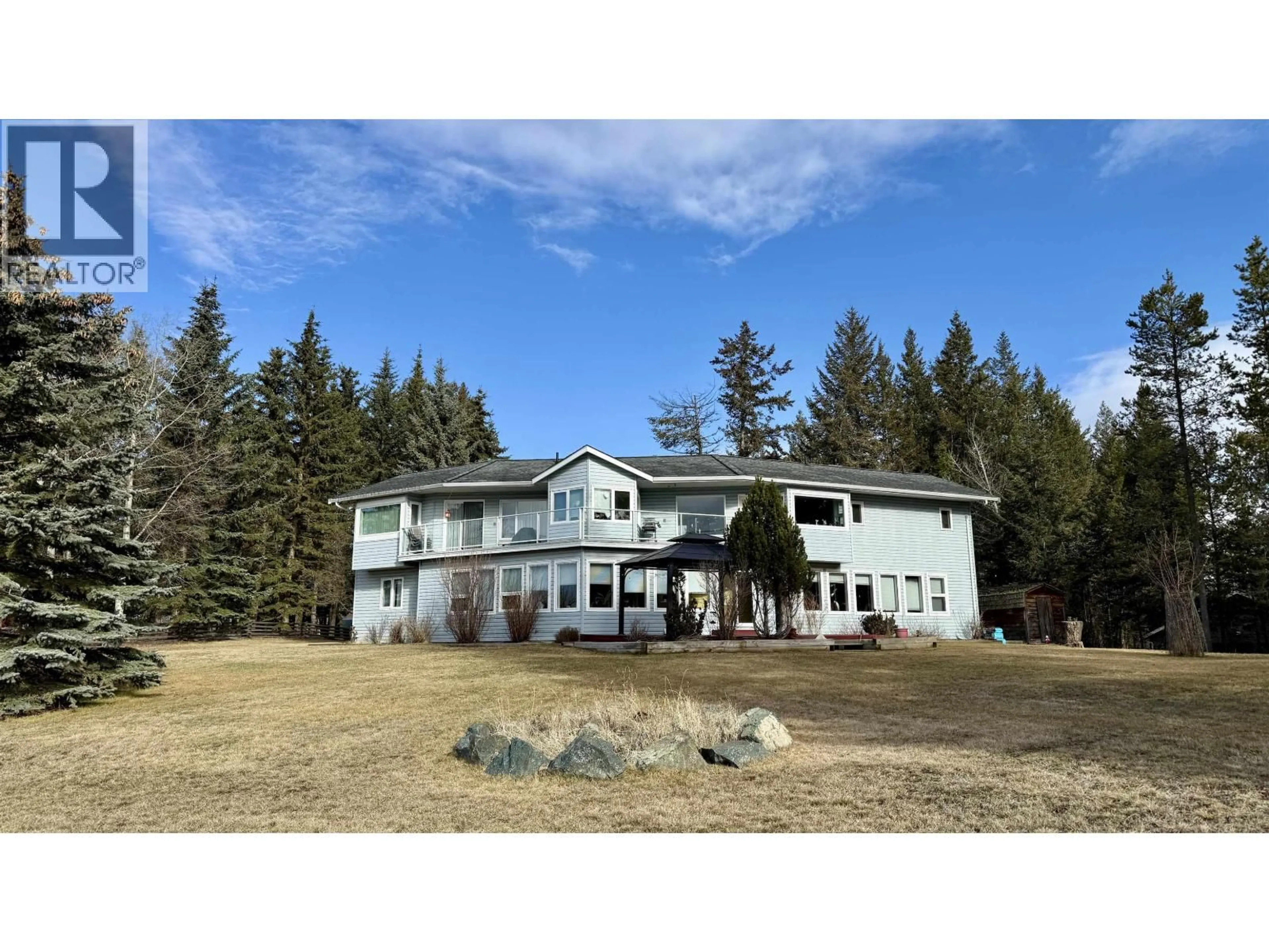 A pic from outside/outdoor area/front of a property/back of a property/a pic from drone, unknown for 5466 DONSLEEQUA COURT, 108 Mile Ranch British Columbia V0K2Z0